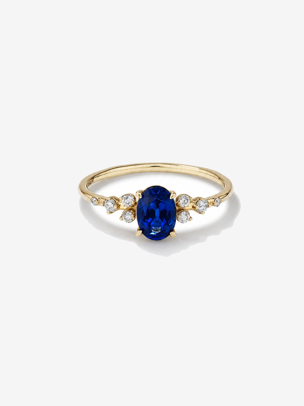 Sapphire and 0.12 Carat TW Diamond Ring 10kt Yellow Gold