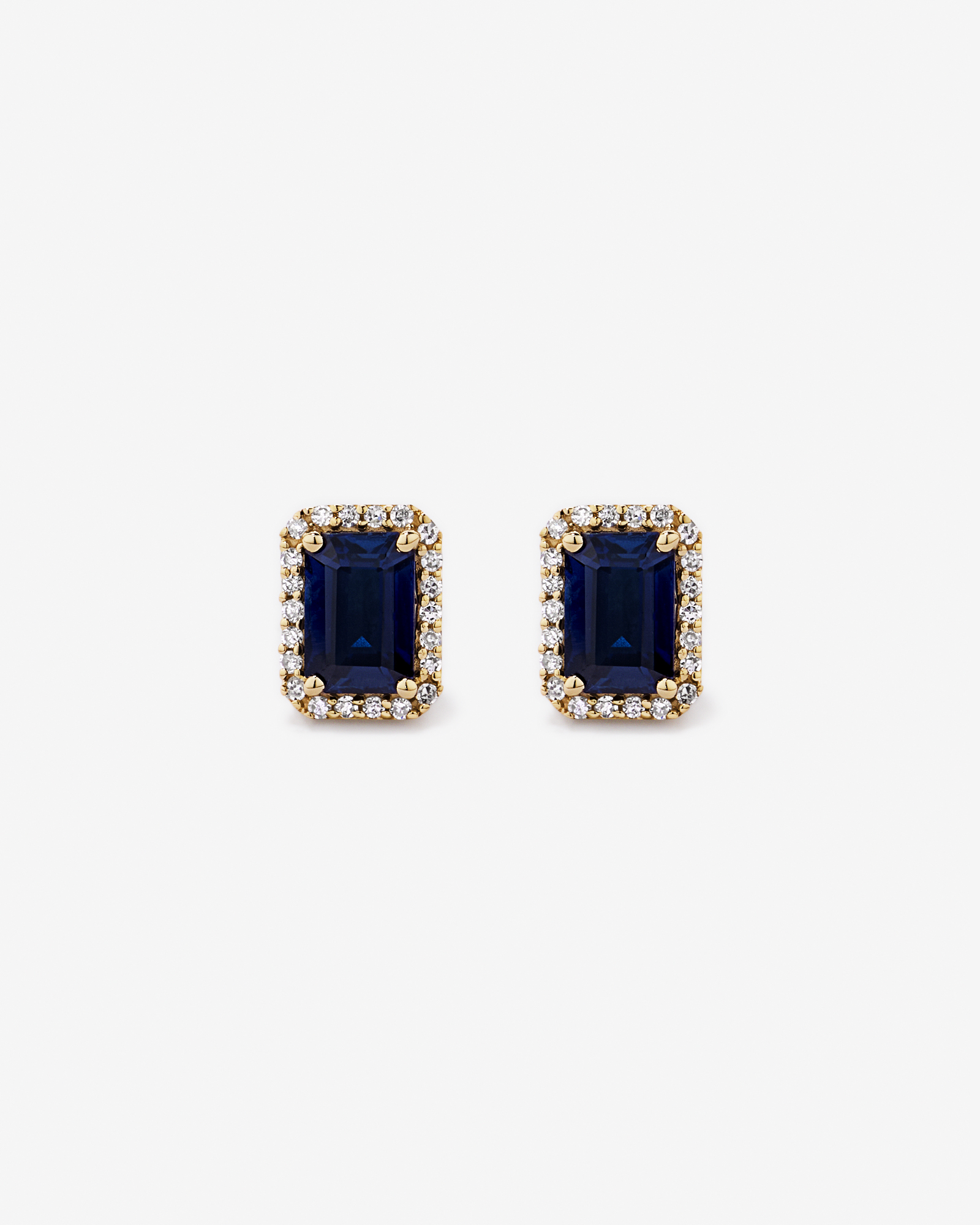 Emerald Cut Created Sapphire and Diamond Halo Earrings in 10kt Yellow Gold