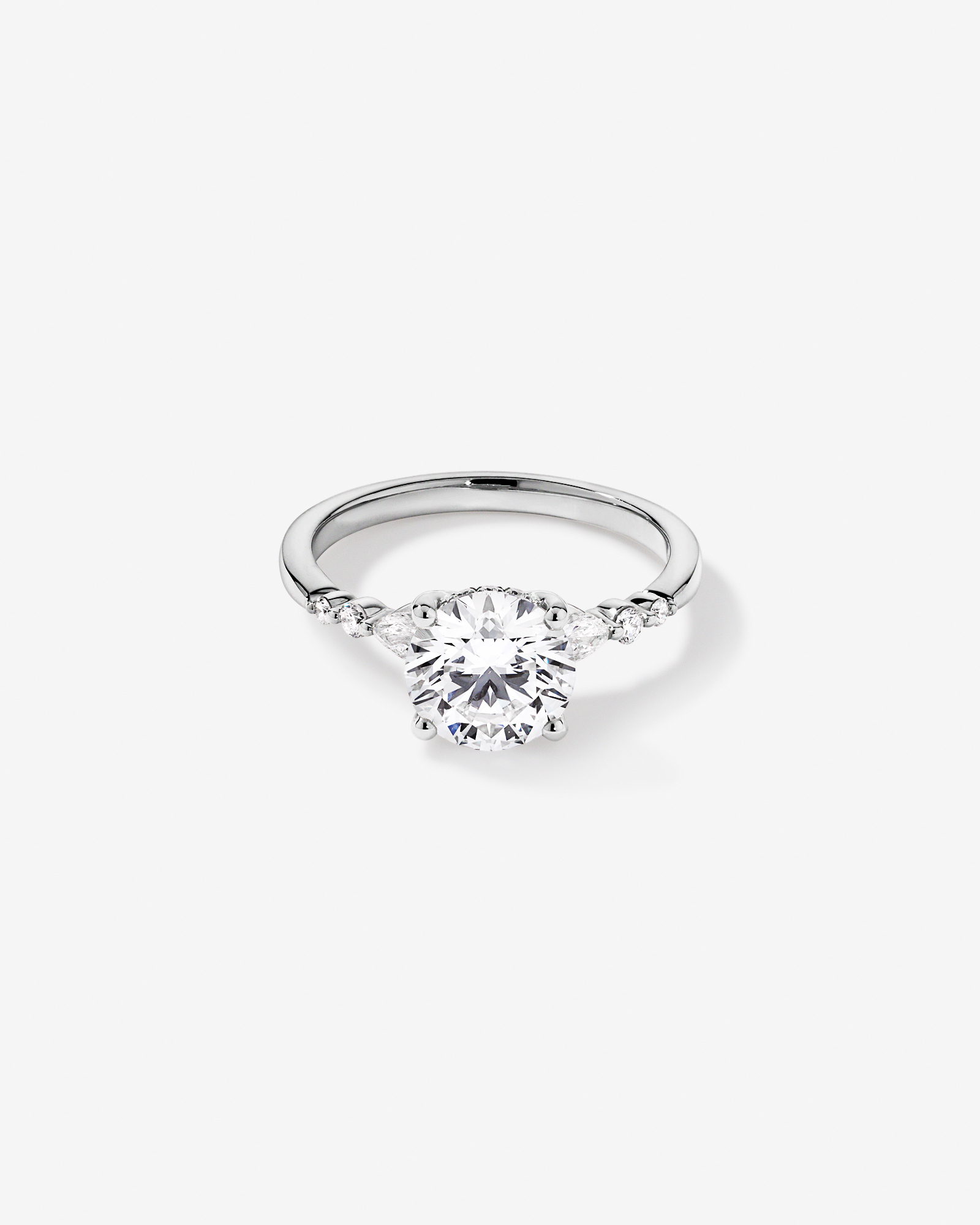 2.28 Carat TW Round Brilliant and Pear Laboratory-Grown Diamond Side Accent Ring 14kt Gold