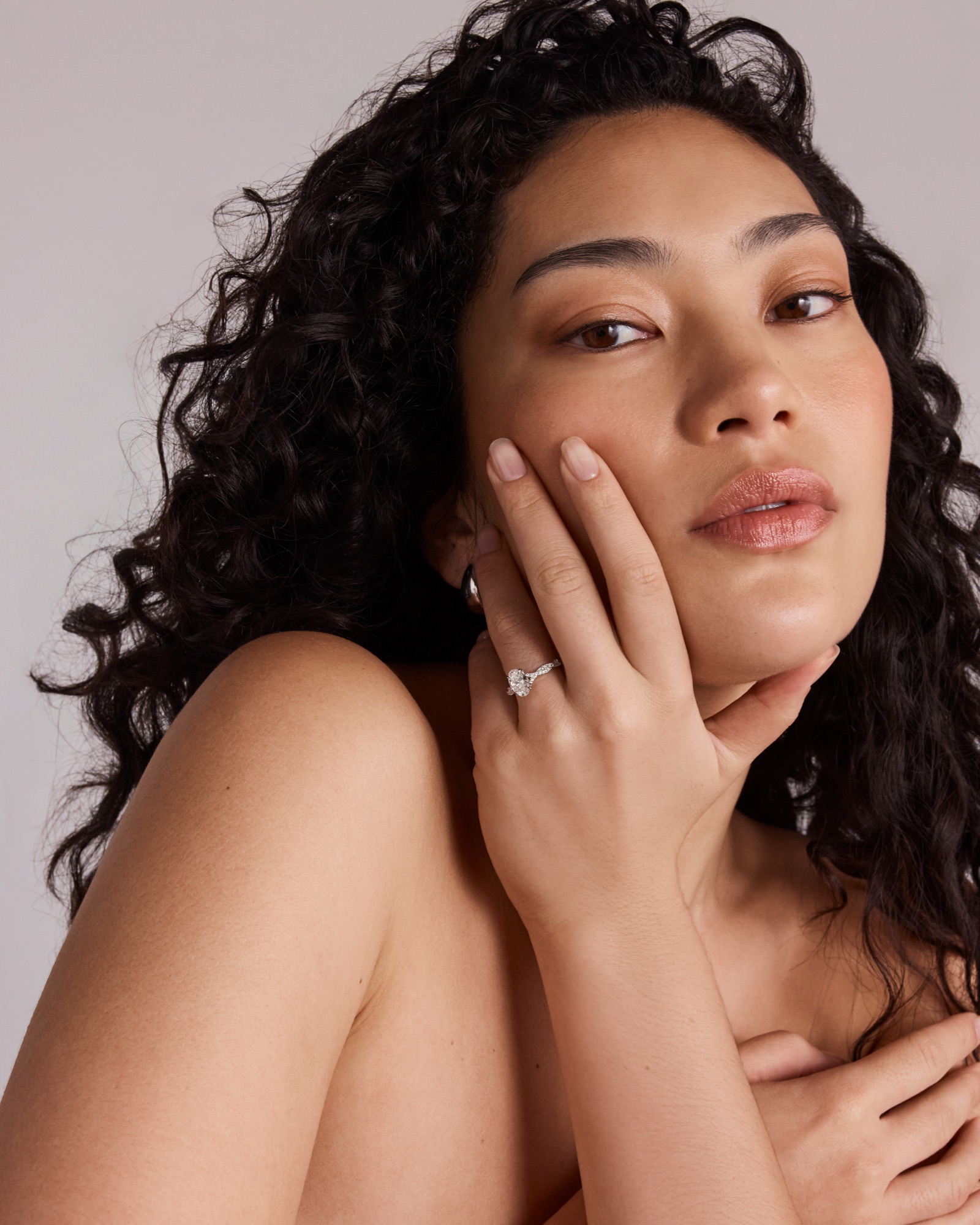 1.70 Carat TW Oval Cut Lab-Grown Diamond Twist Band Engagement Ring 14kt White Gold