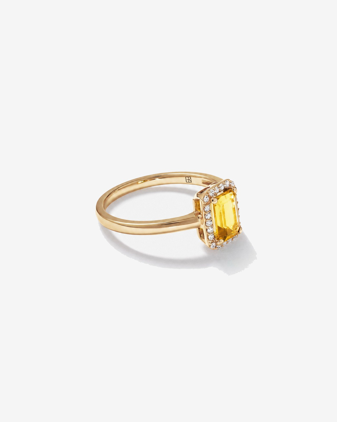 Bague en or jaune 10 carats avec citrine taille émeraude et halo de diamants