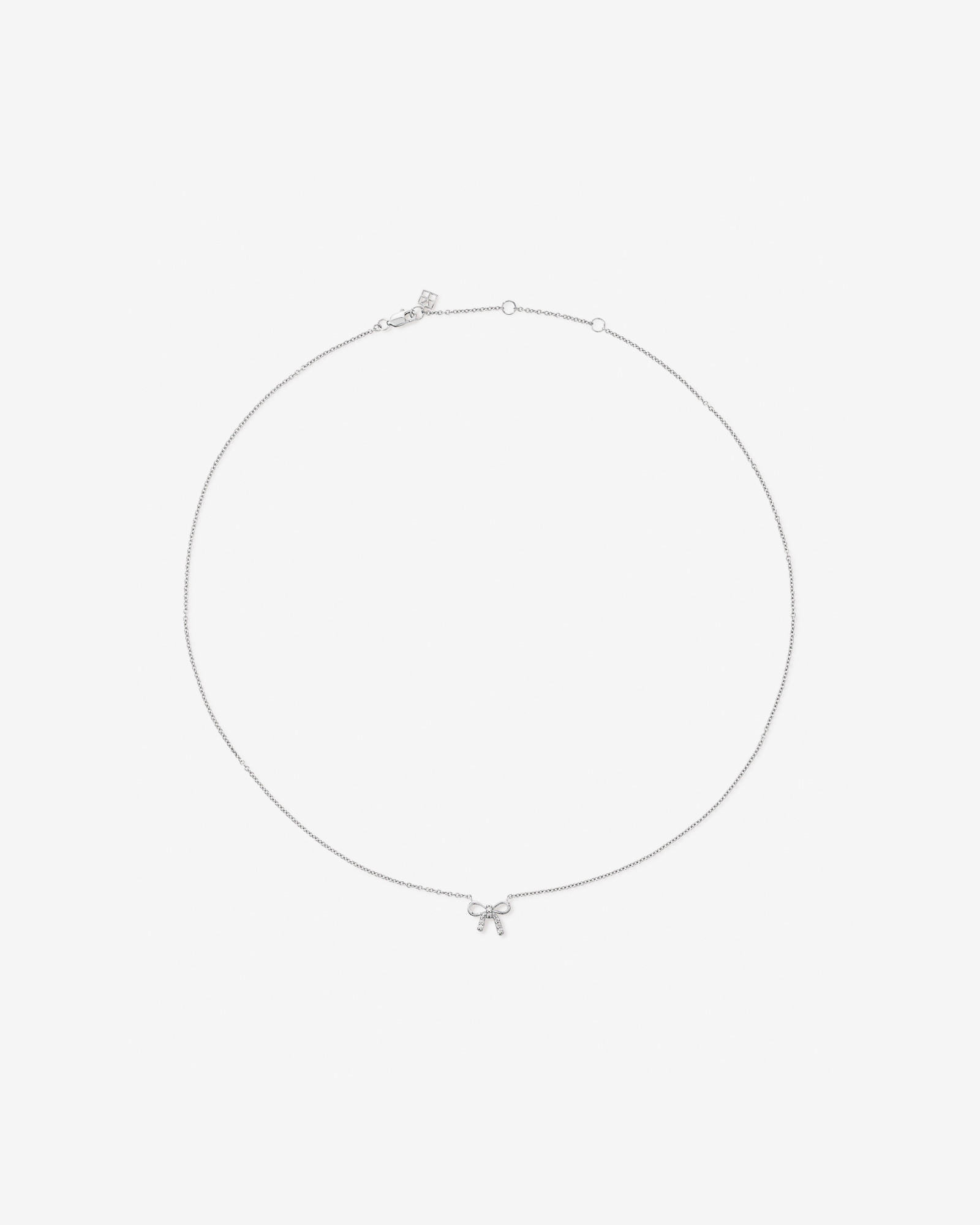 Parure collier et boucles d’oreilles clous nœud avec oxydes de zirconium en argent sterling