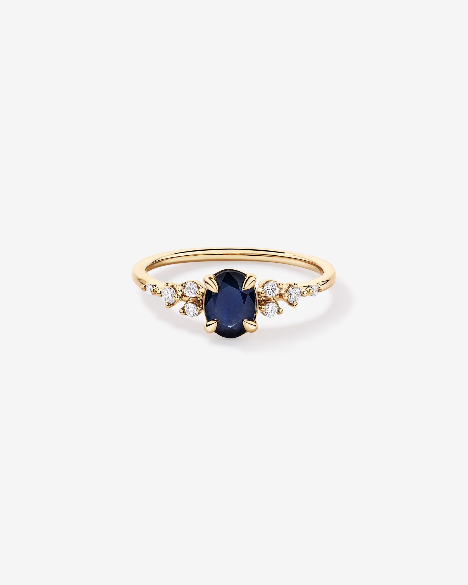 Sapphire and 0.12 Carat TW Diamond Ring 10kt Yellow Gold