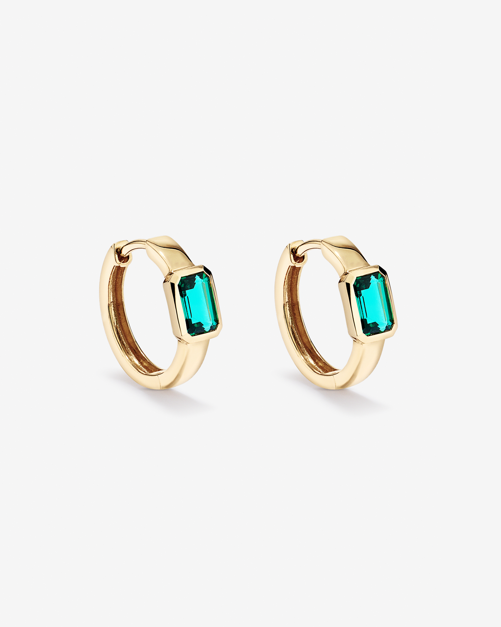 Created Emerald Bezel Huggie Earrings in 10kt Yellow Gold