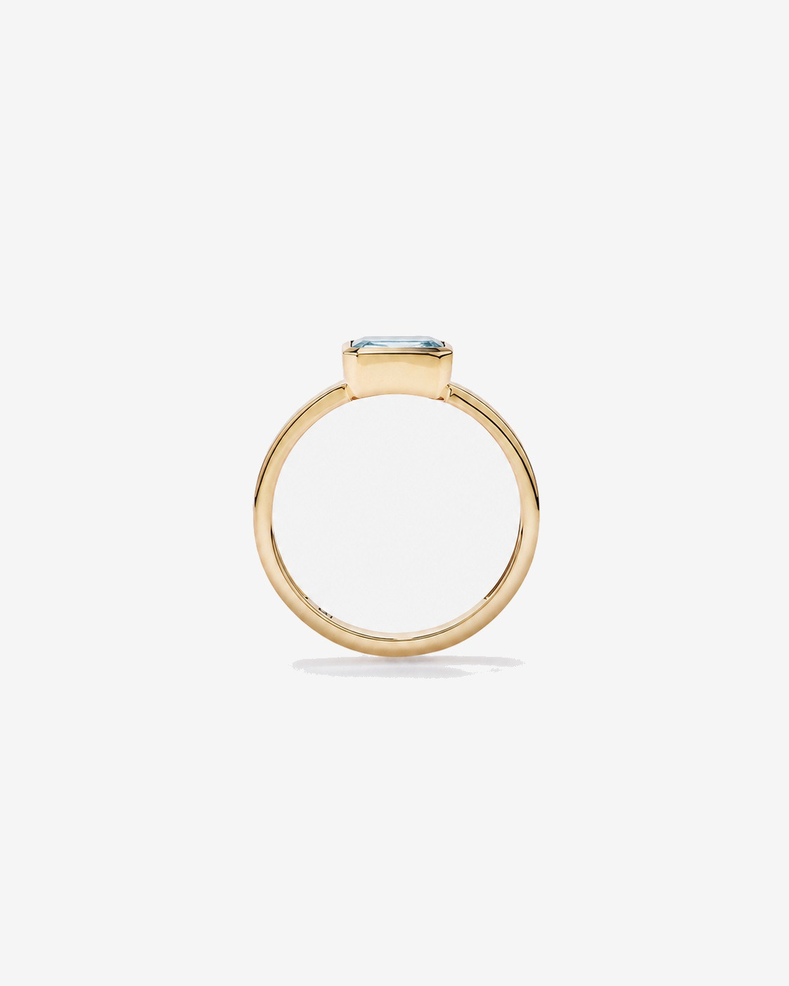 Bague Aigue-marine sertie clos en or jaune 10 ct