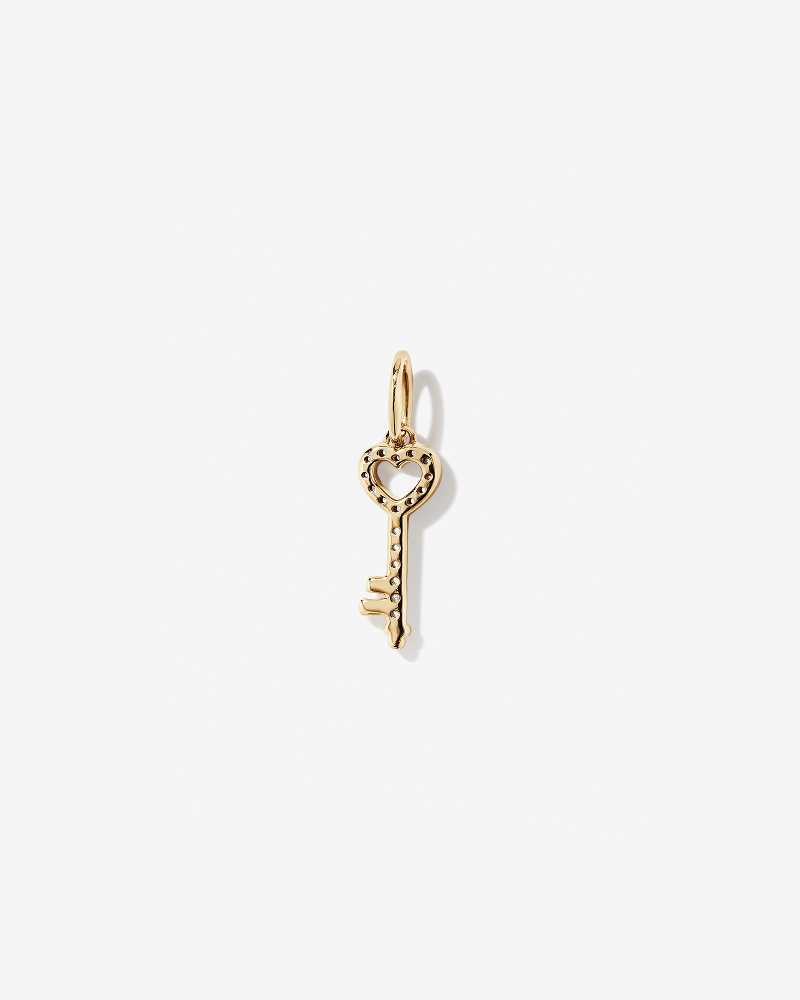 0.04 Carat TW Diamond Key Pendant in 10kt Yellow Gold