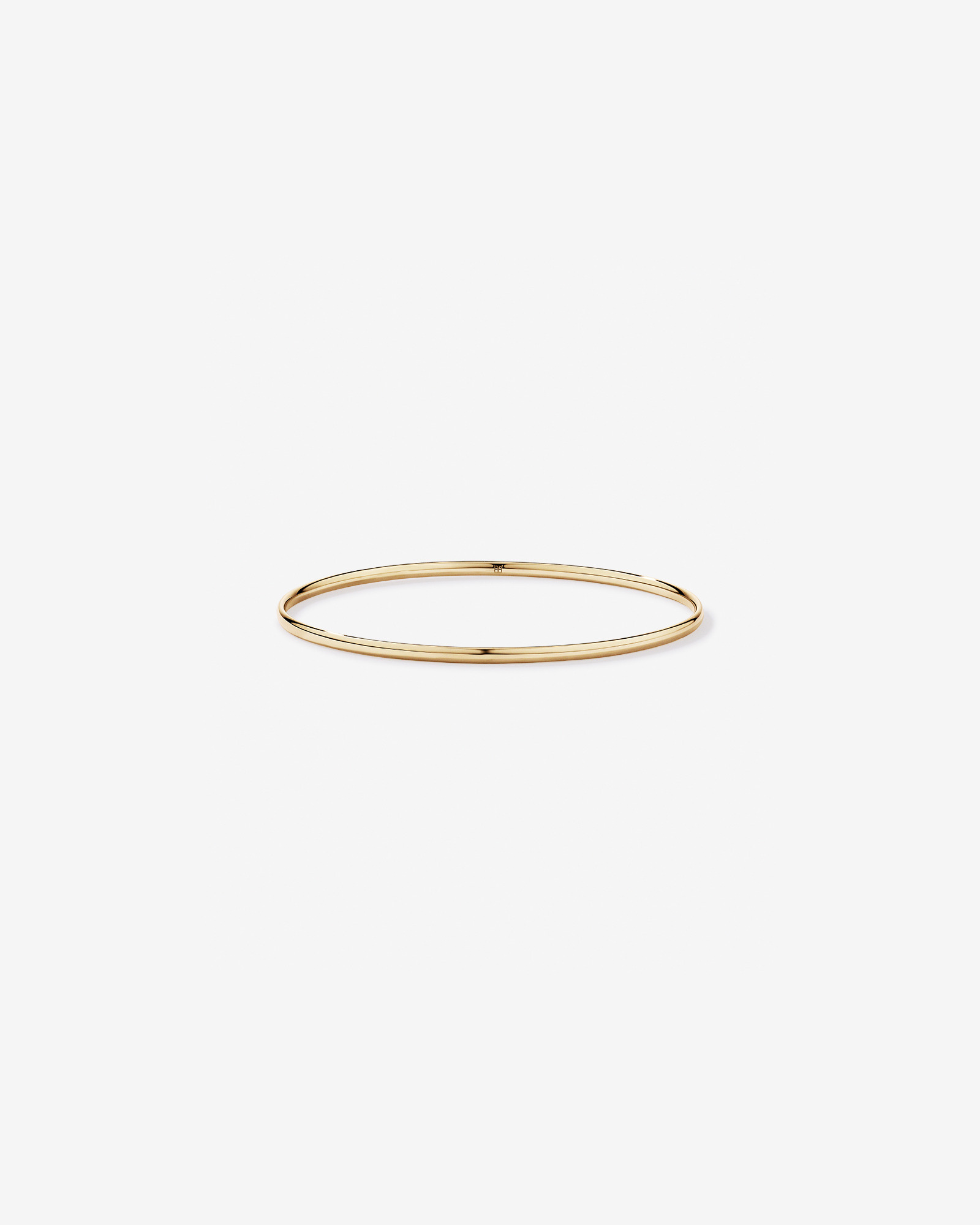 Slim Oval Bangle in 10kt Yellow Gold