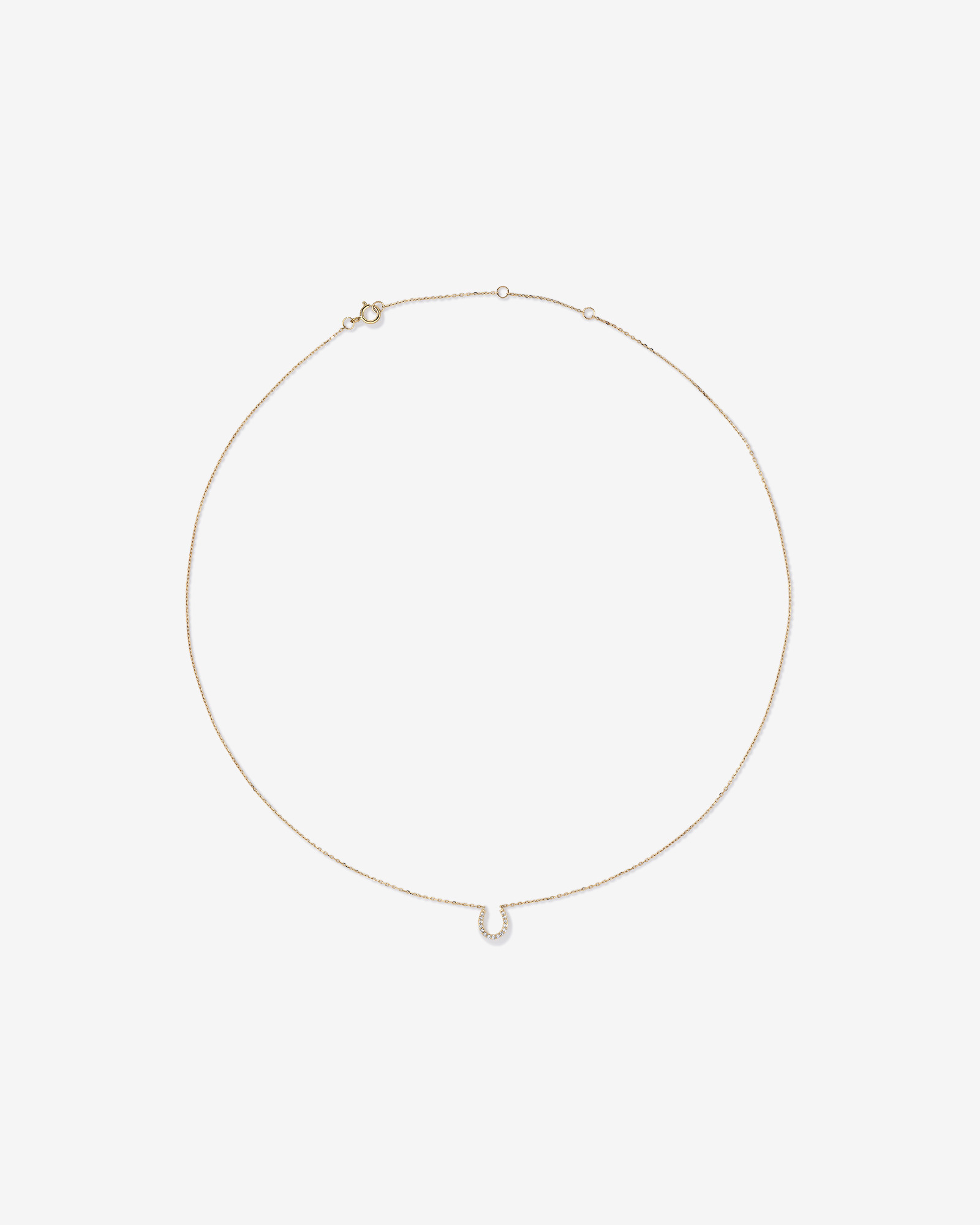 Collier à pendentif fer à cheval en or jaune 10 K avec diamants totalisant 0,10 ct