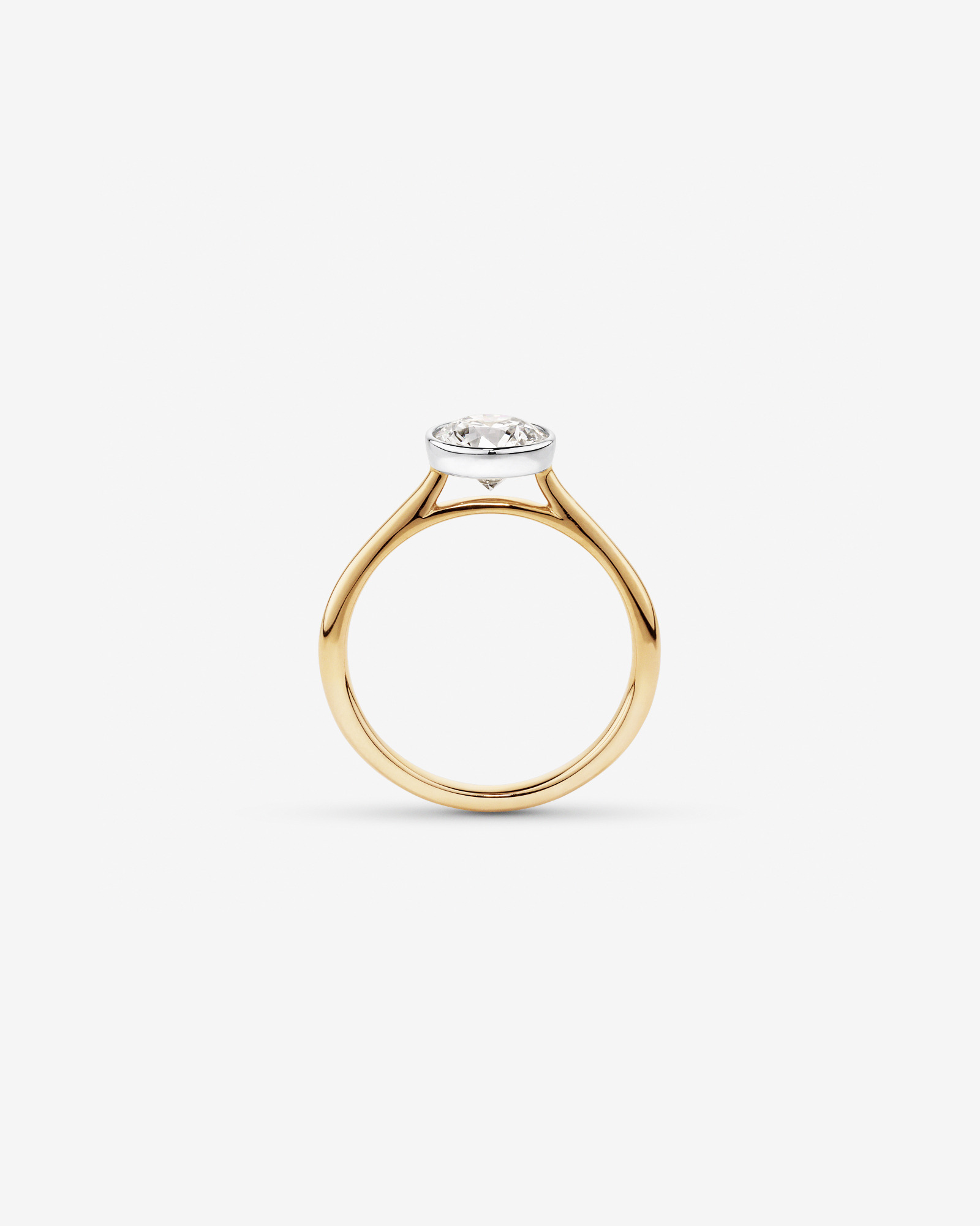 1.25 Carat TW Round Brilliant Laboratory-Grown Diamond Solitaire Bezel Set Engagement Ring in 14kt Yellow and White Gold
