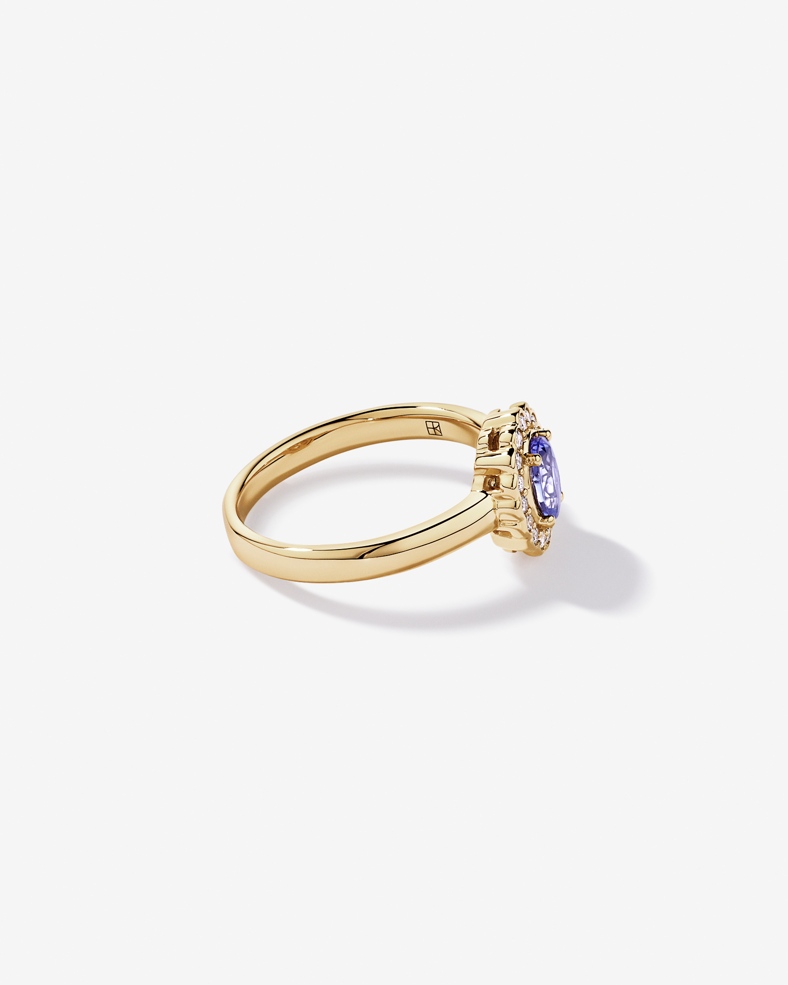 Tanzanite & 0.15TW of Diamond Halo Ring 10kt Yellow Gold