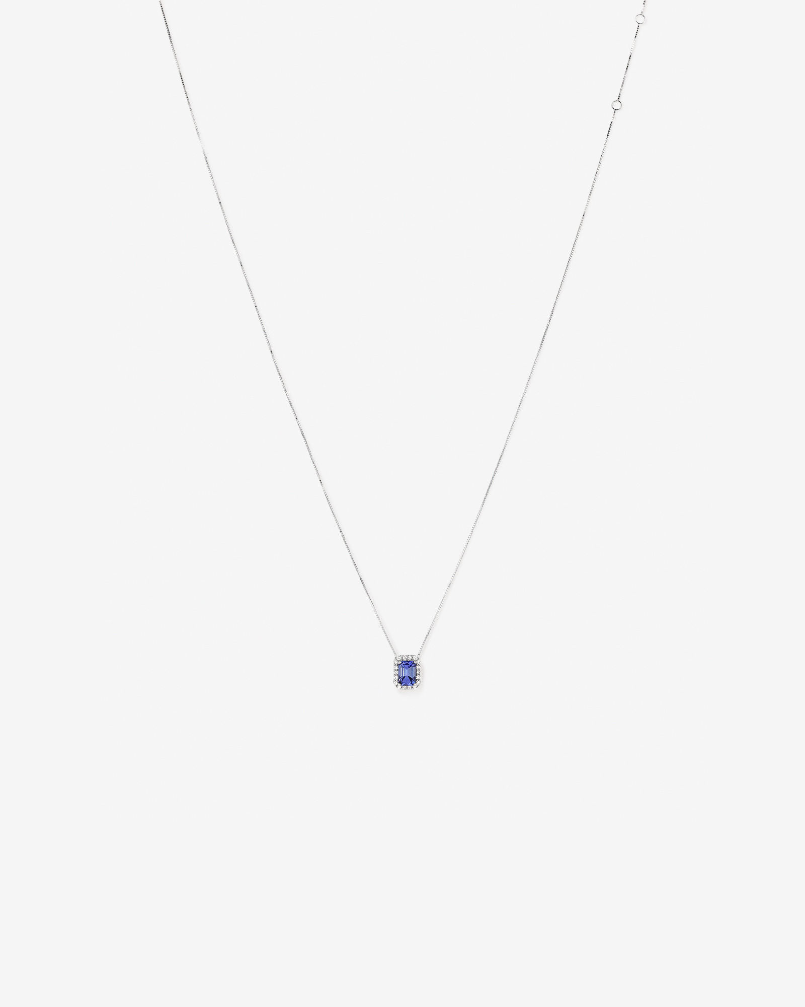Emerald Cut Blue Tanzanite and 0.17 Carat TW Diamond Halo Pendant in 14kt White Gold