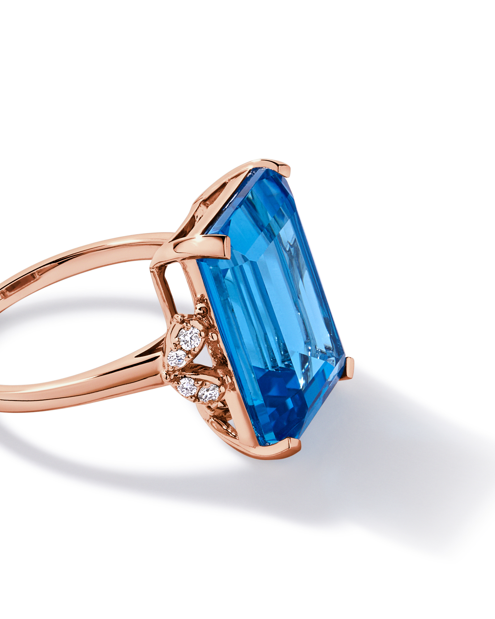 Emerald Cut Swiss Blue Topaz & 0.08 Carat TW Diamond Ring 10kt Rose Gold