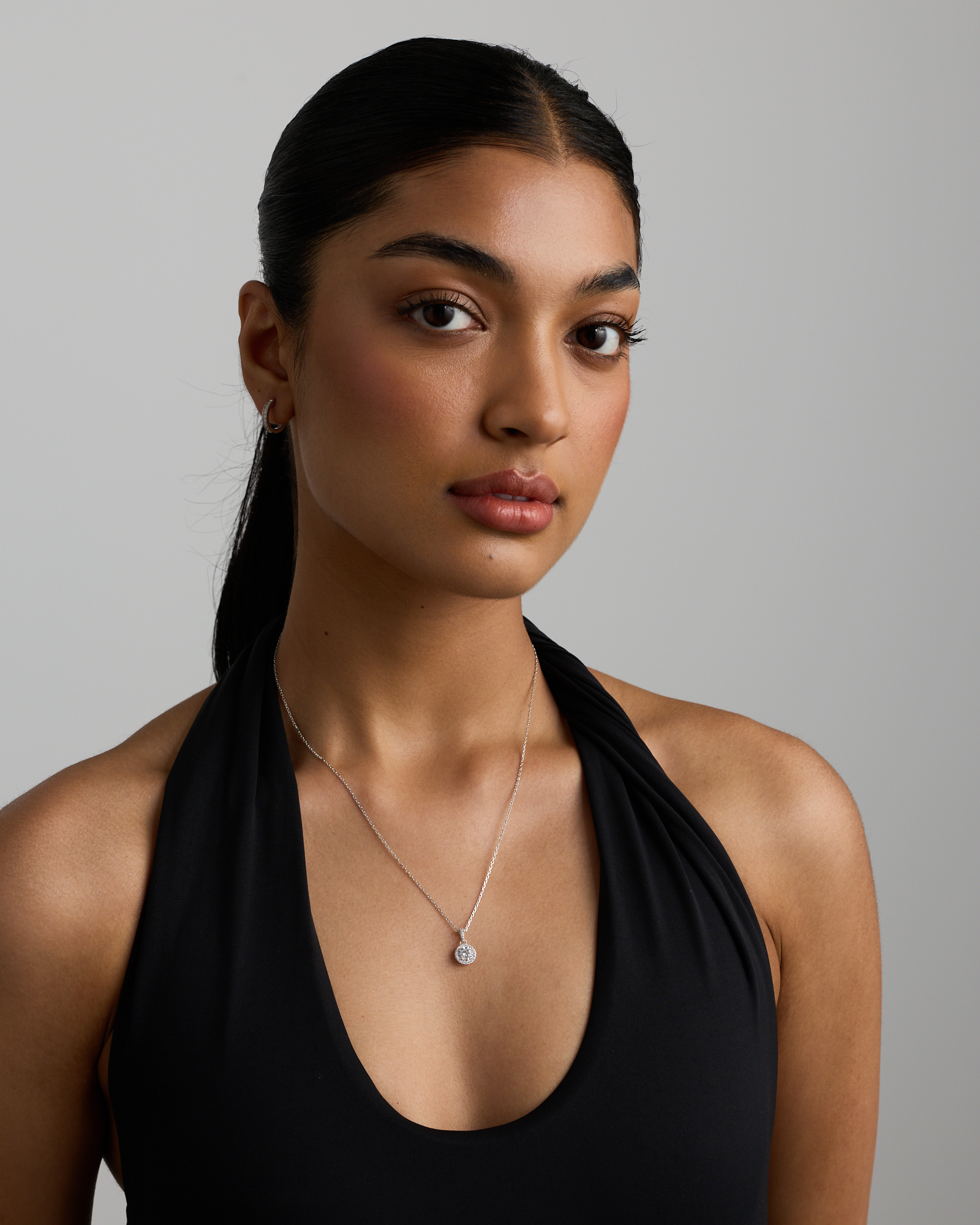 Round Brilliant Cubic Zirconia Halo Pendant Necklace in Sterling Silver