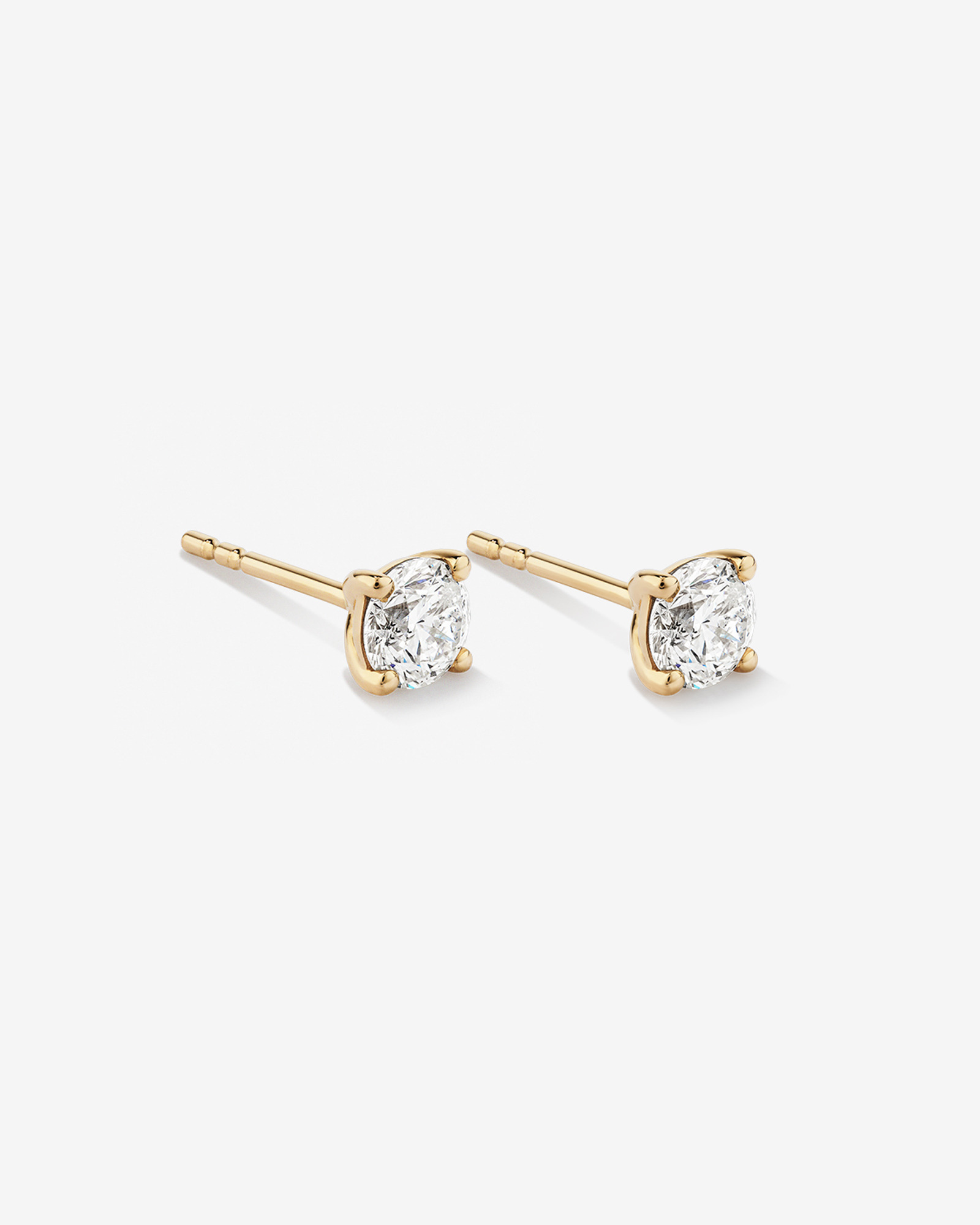 0.75 Carat TW Diamond Solitaire Stud Earrings 18kt Yellow Gold