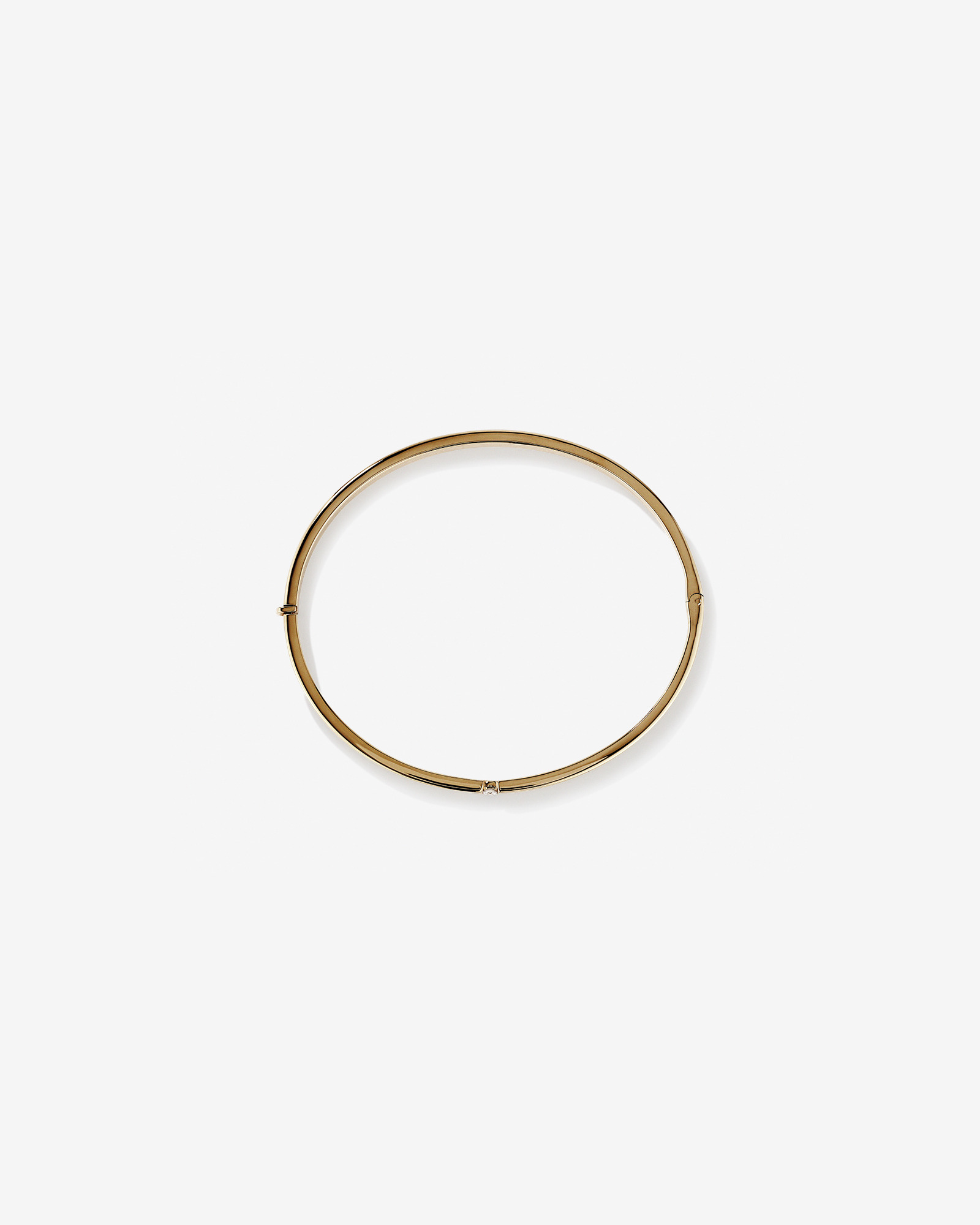 Diamond Accent Oval Bangle in 10kt Yellow Gold
