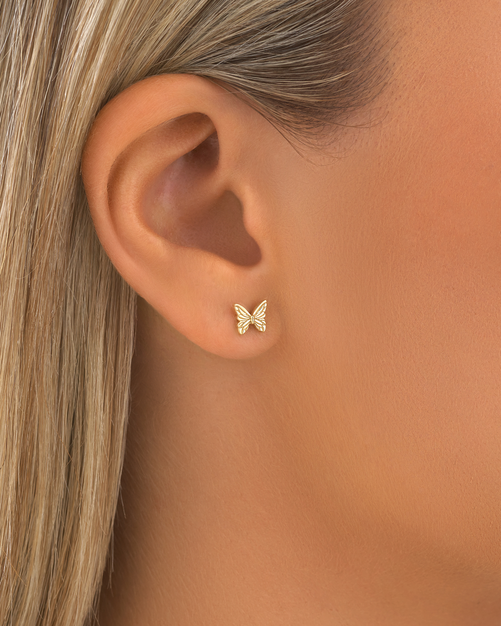 Boutons d'oreilles papillon en or jaune 10 K