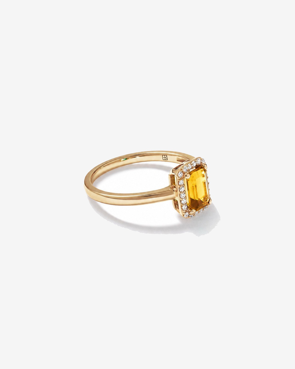 Bague en or jaune 10 carats avec citrine taille émeraude et halo de diamants