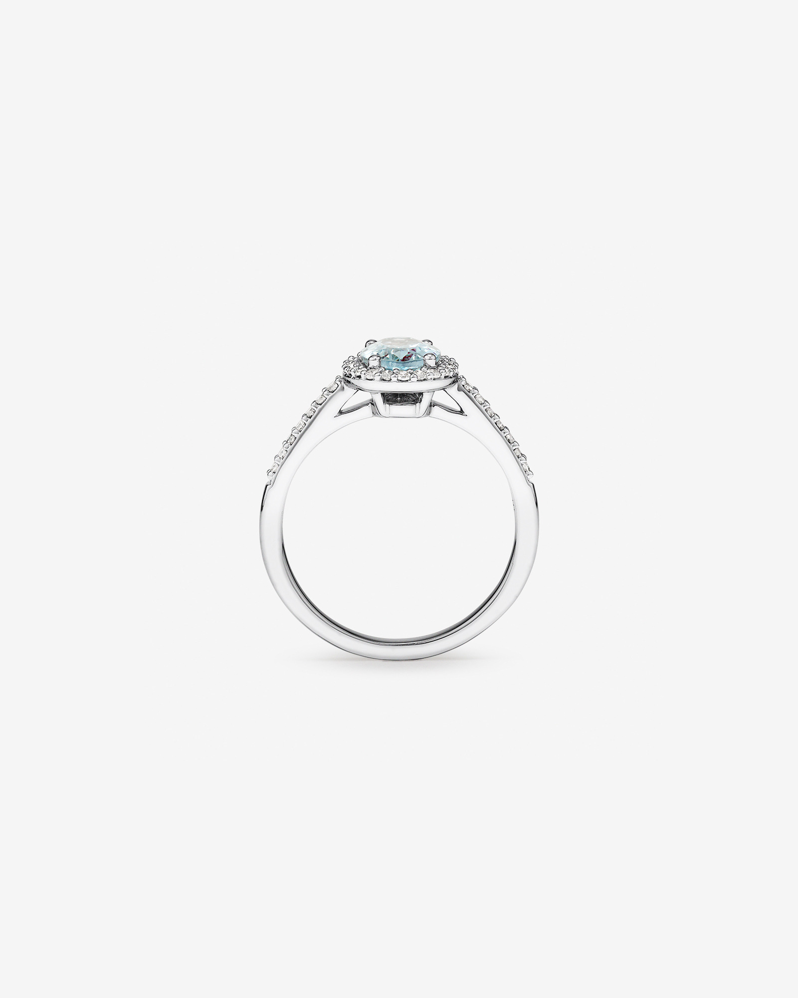 Oval Cut Blue Aquamarine Gemstone and 0.29 Carat TW Diamond Halo Ring in 10kt White Gold