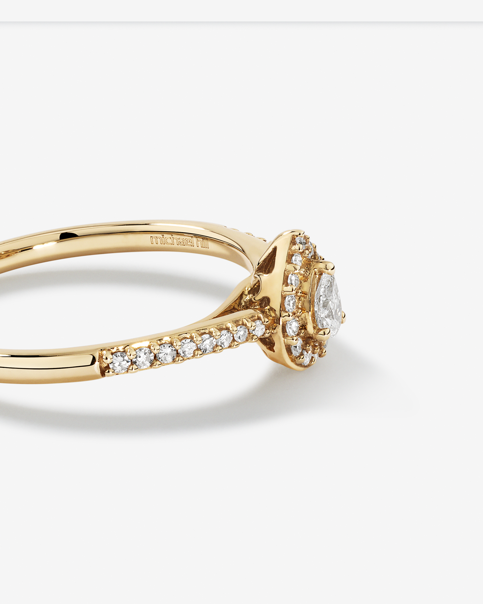 Bague de fiançailles halo en forme de poire avec 0,20 TW de diamants en or jaune 10 carats