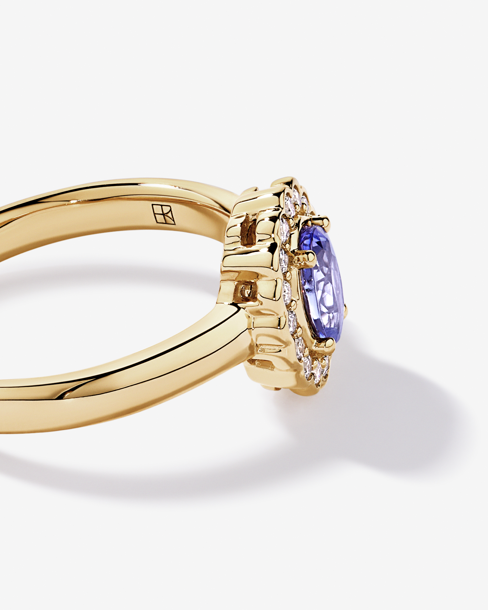 Tanzanite & 0.15TW of Diamond Halo Ring 10kt Yellow Gold
