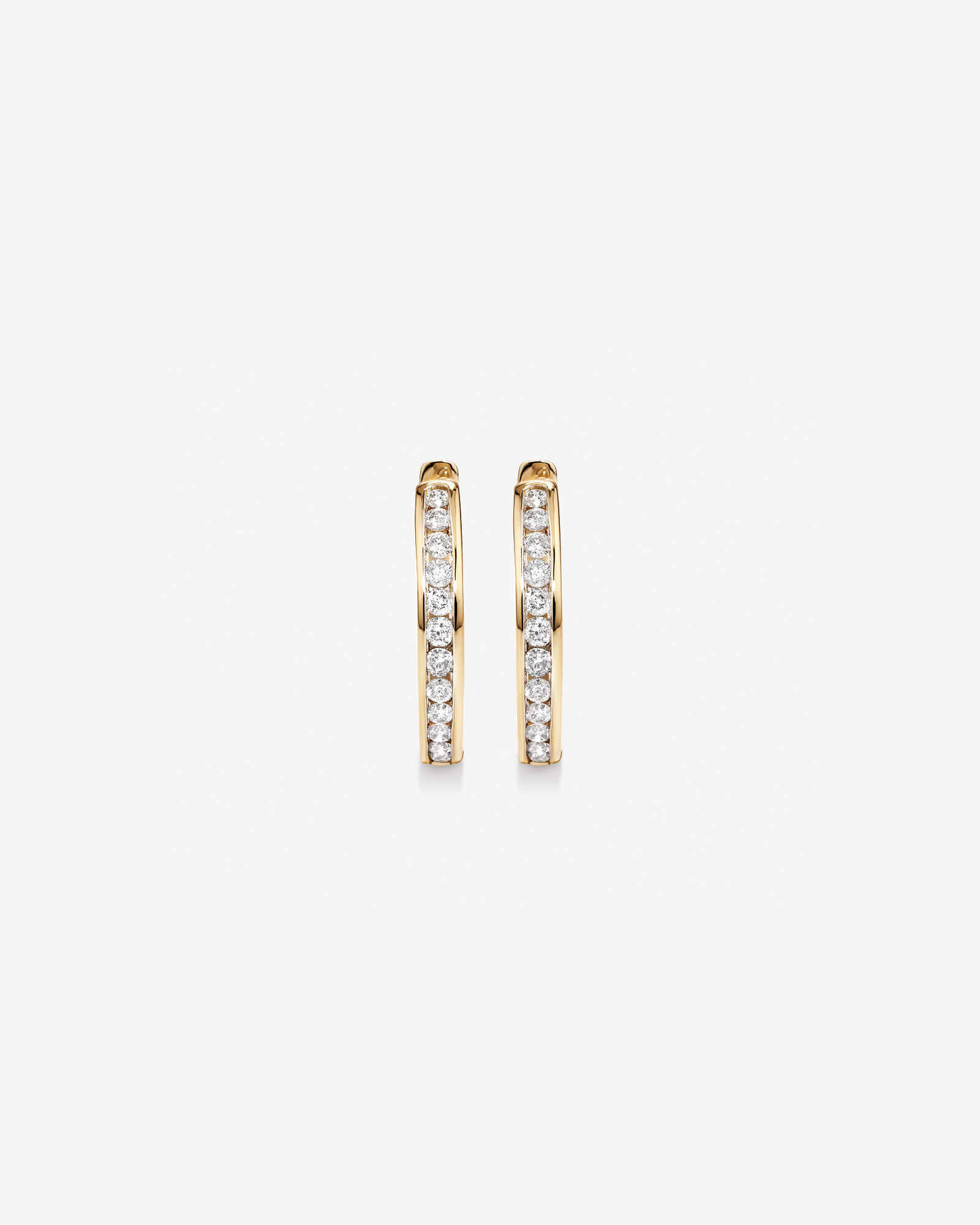 0.25 Carat TW Channel Set Round Brilliant Diamond Huggie Hoop Earrings in 10kt Yellow Gold