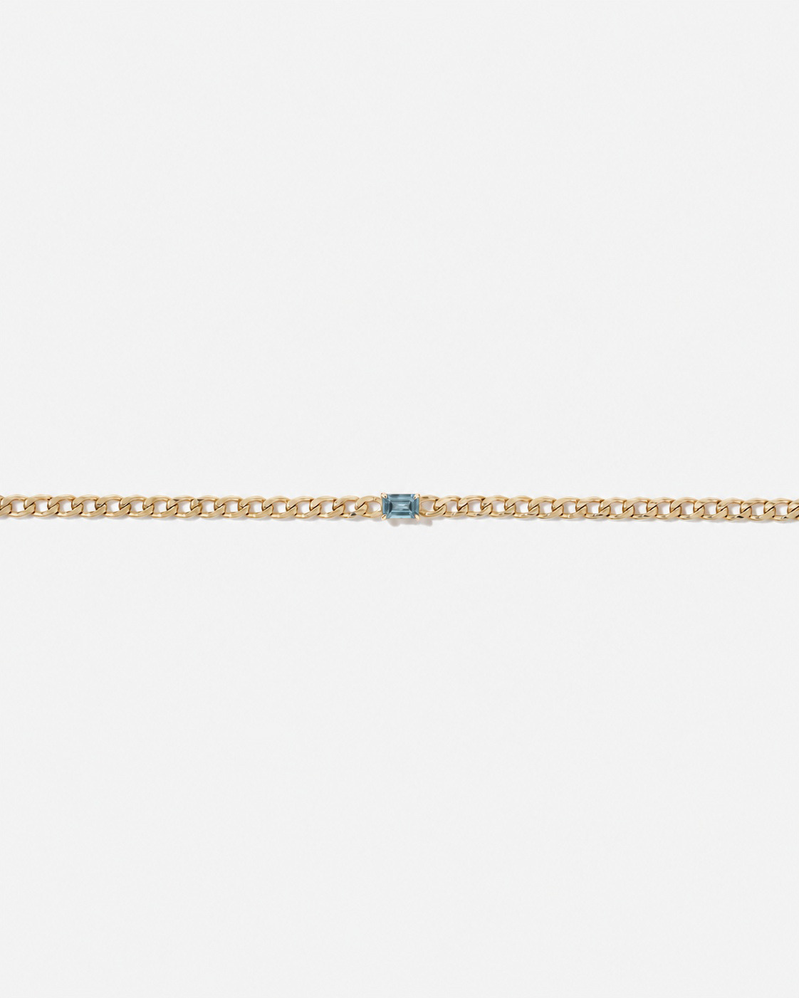 Bracelet gourmette Topaze bleue en or jaune 10 ct