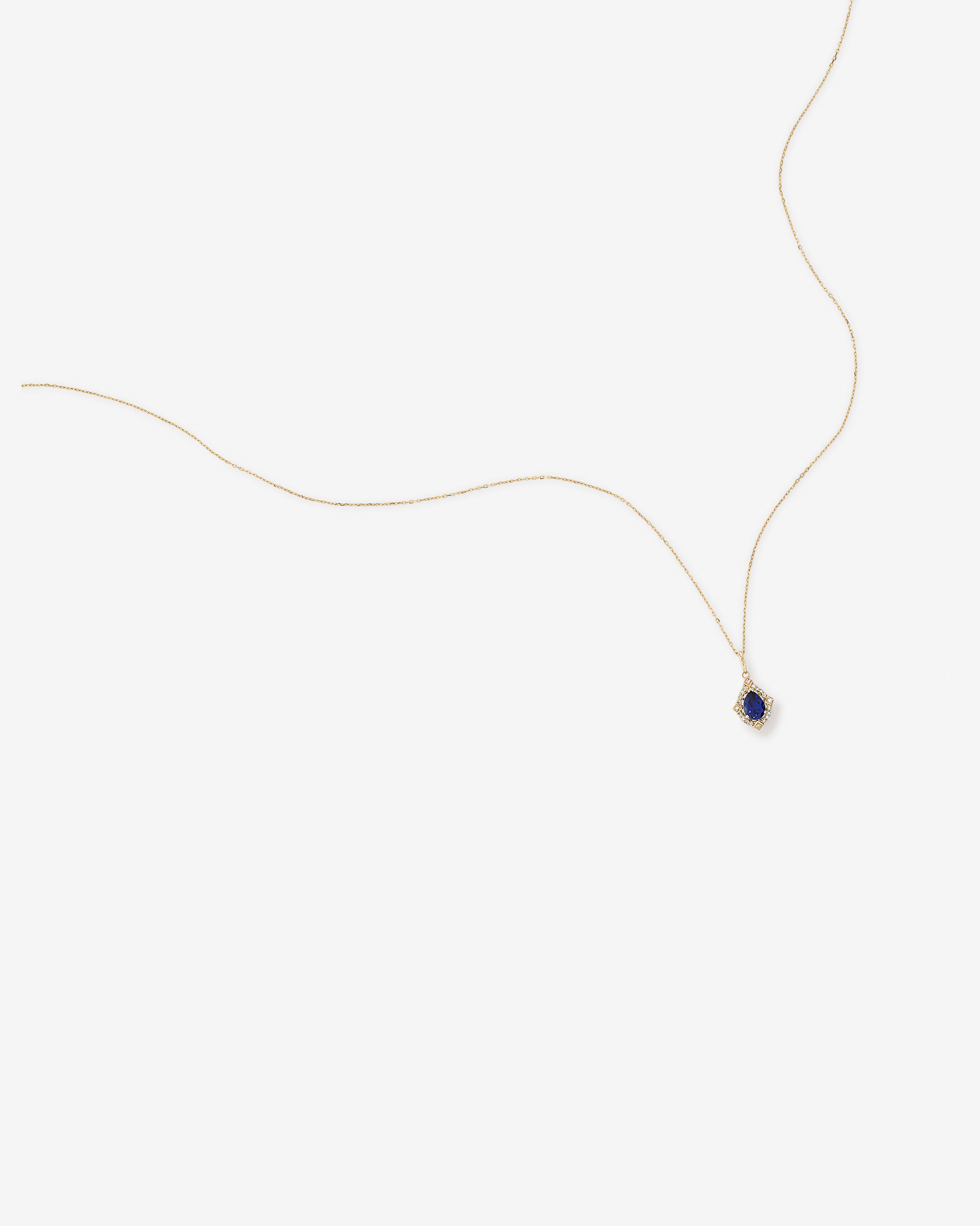 Pear Cut Created Sapphire and Diamond Halo Pendant Necklace in 10kt Yellow Gold