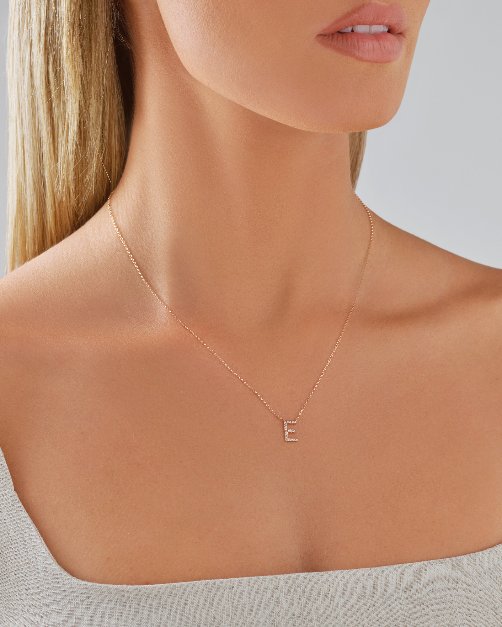 "E" Initial Necklace with 0.10 Carat TW of Diamonds in 10kt Yellow Gold