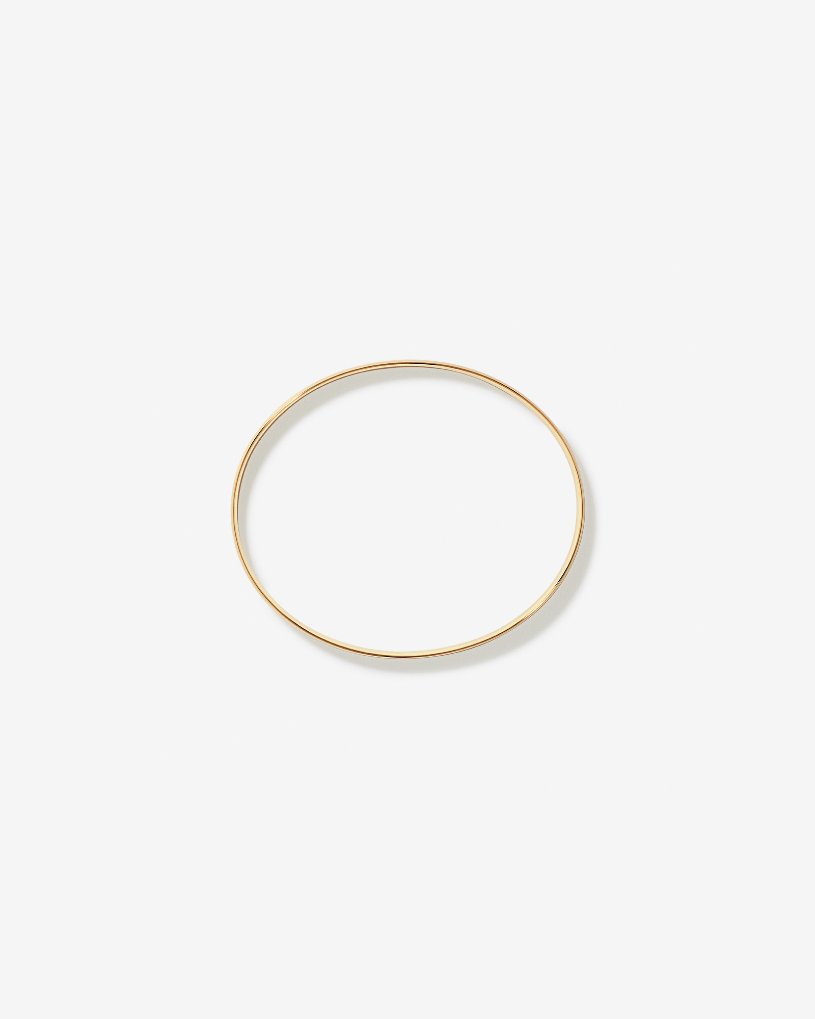 Bold Oval Bangle in 10kt Yellow Gold
