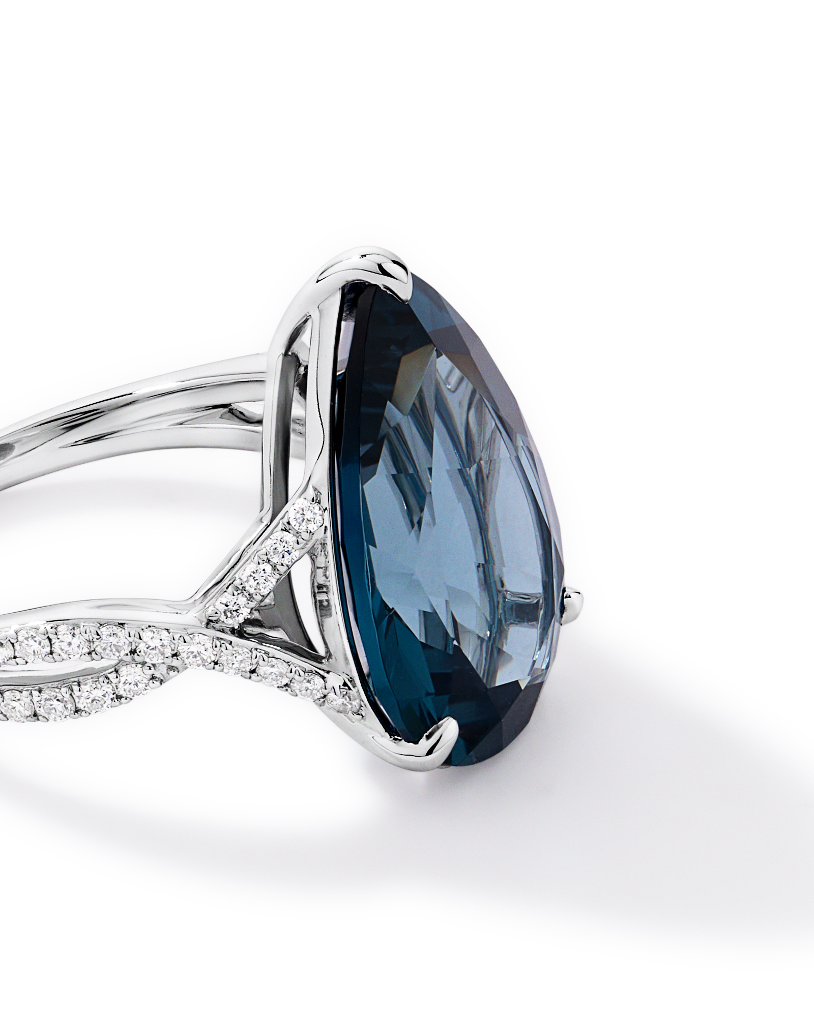 Pear Cut London Blue Topaz & 0.28 Carat TW Diamond Twist Ring 10kt Gold