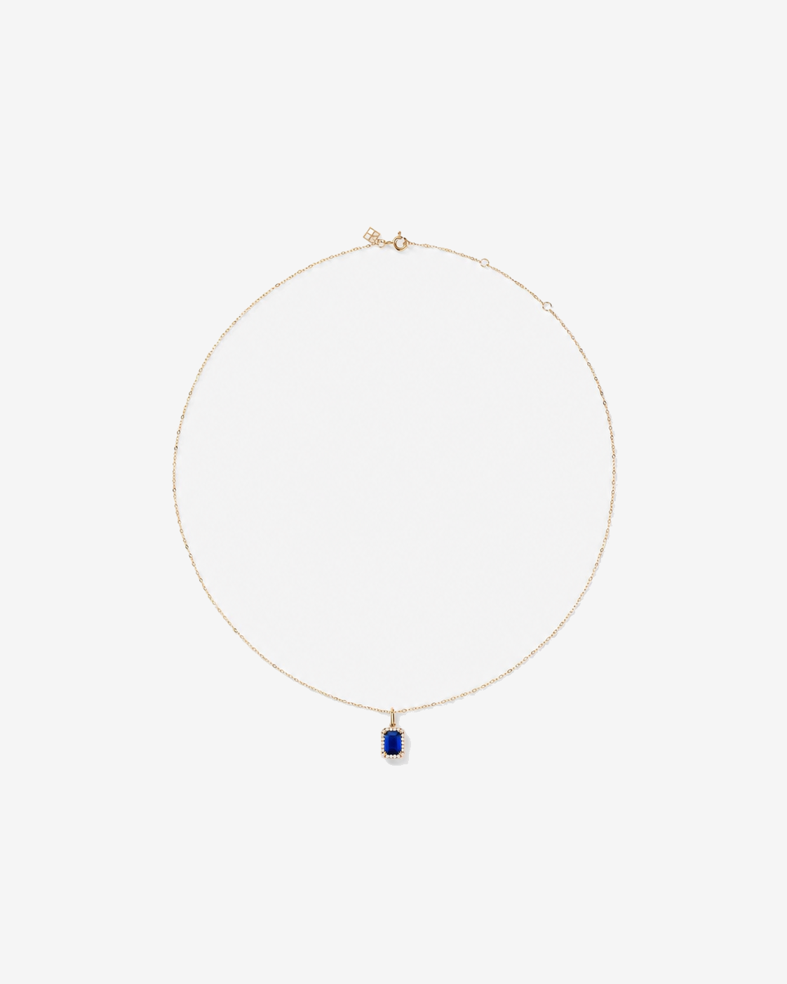 Emerald Cut Created Sapphire and Diamond Halo Pendant with Chain in 10kt Yellow Gold
