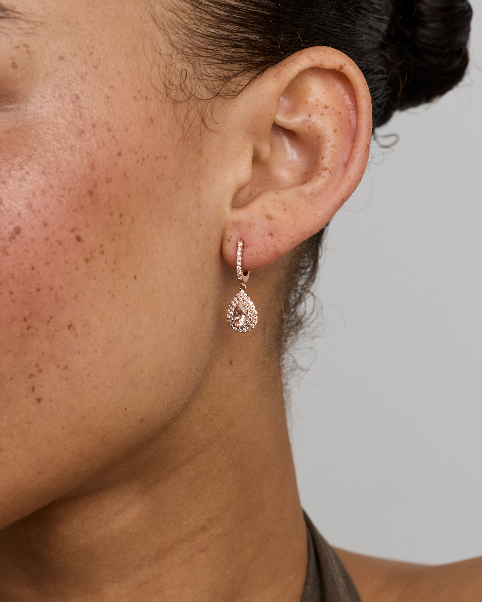 Pear Cut Morganite Gemstone and 0.40 Carat TW Diamond Halo Huggie Drop Earrings in 10kt Rose Gold