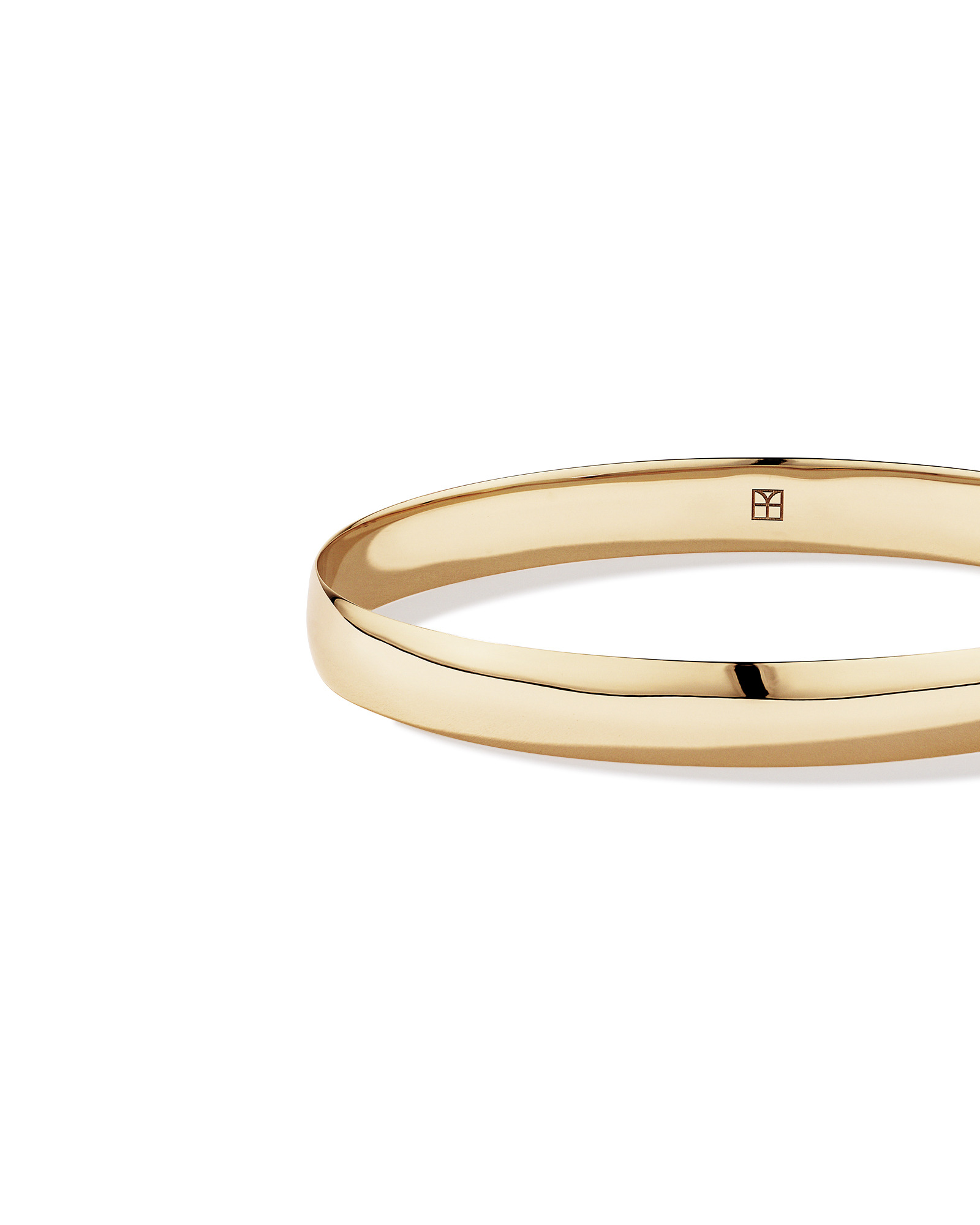 65mm (2.5") 7.7mm Width Solid Oval Bangle in 10kt Yellow Gold