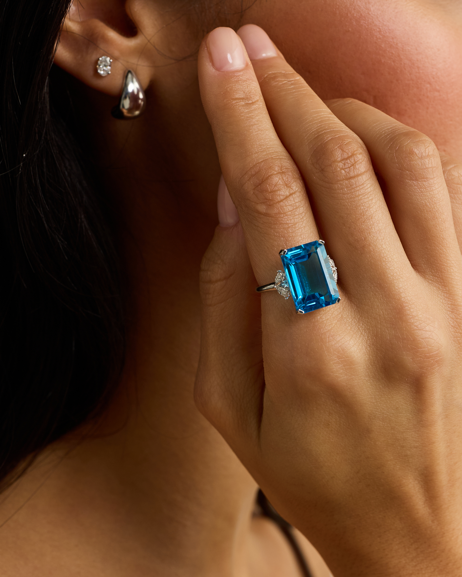 Emerald Cut Swiss Blue Topaz & 0.08 Carat TW Diamond Ring 10kt Gold