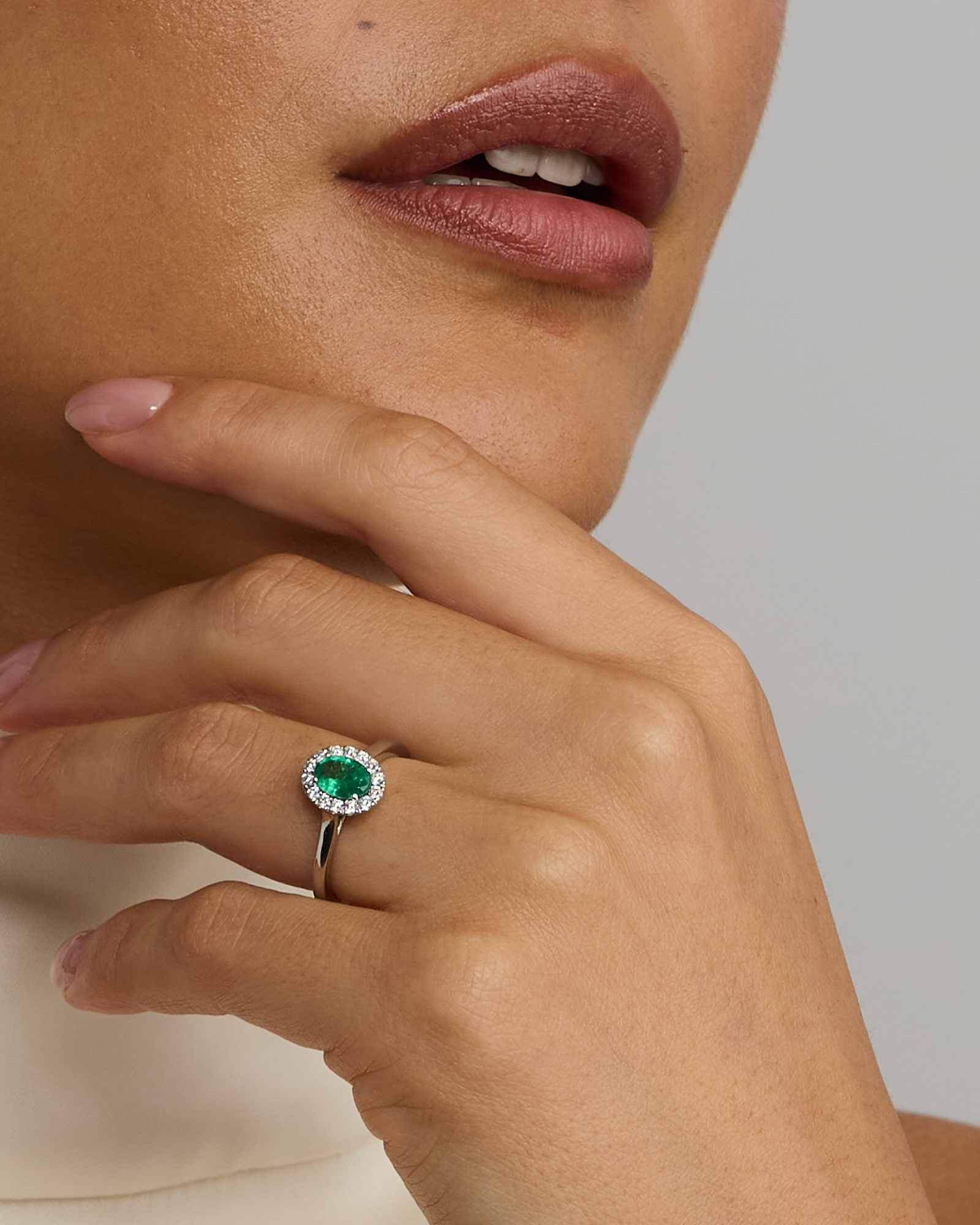 0.25 Carat TW Oval Emerald and Diamond Ring in Recycled Platinum