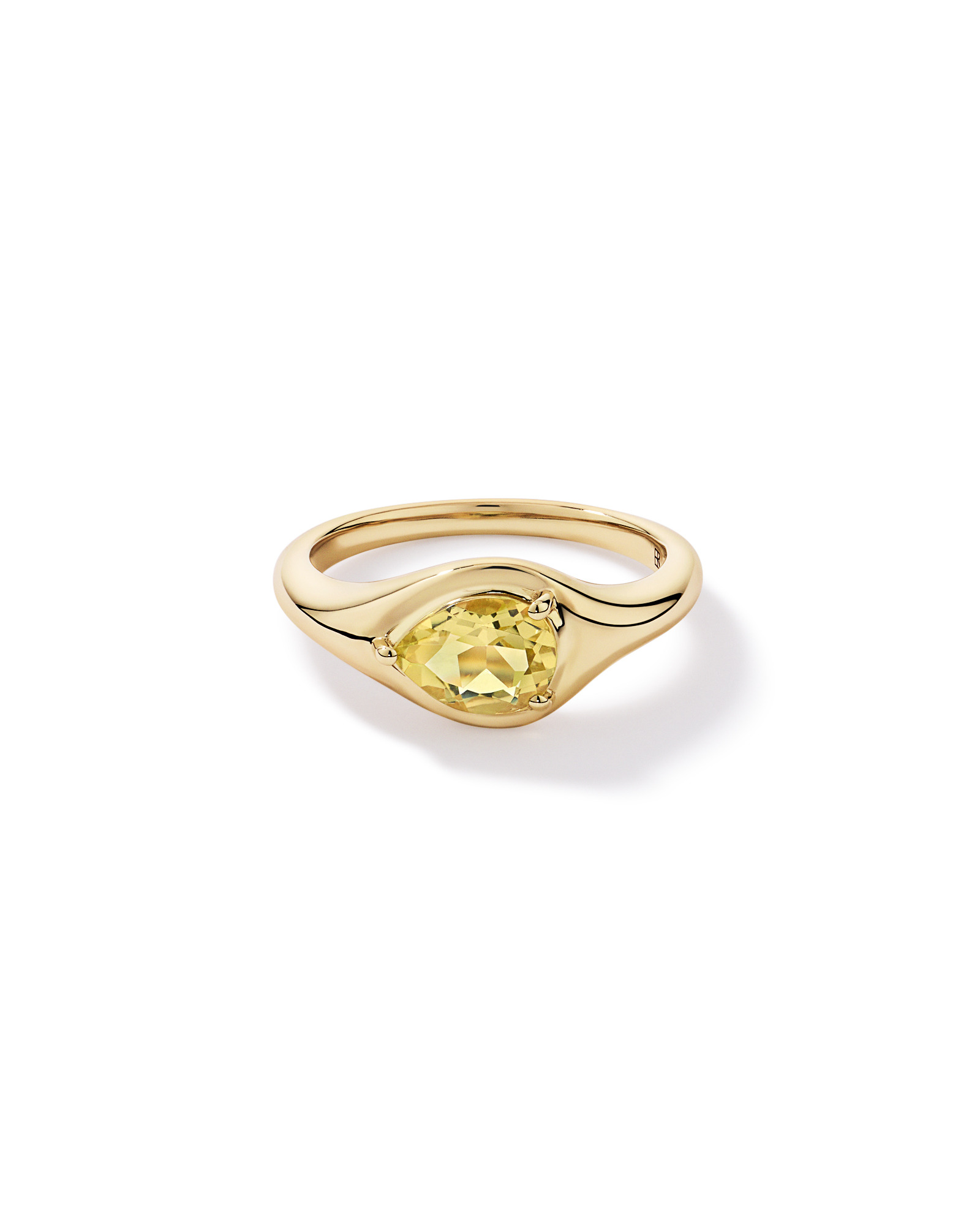 Anneau serti en quartz citron taillé poire d’est ouest or jaune 10 carats