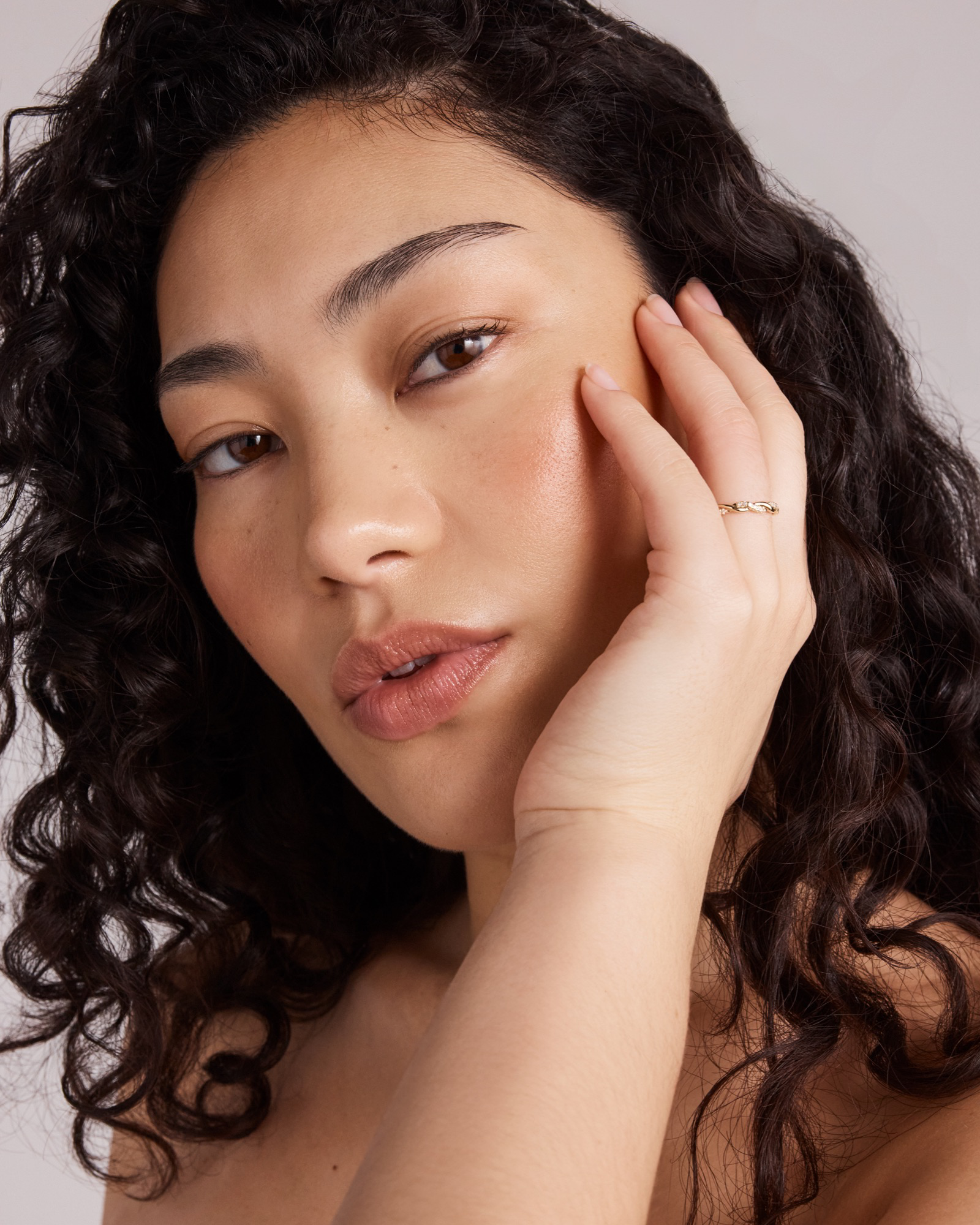 0.11 Carat TW Diamond Twist Wedding Ring in 14kt Yellow Gold