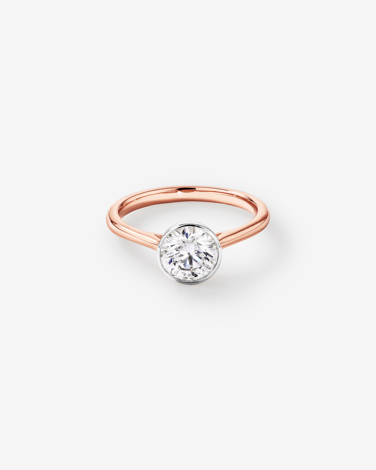 1.25 Carat TW Round Brilliant Laboratory-Grown Diamond Solitaire Bezel Set Engagement Ring in 14kt Rose Gold