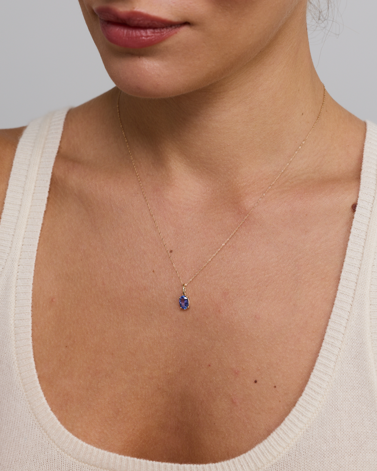 Tanzanite Solitaire Pendant With Chain in 10kt Yellow Gold