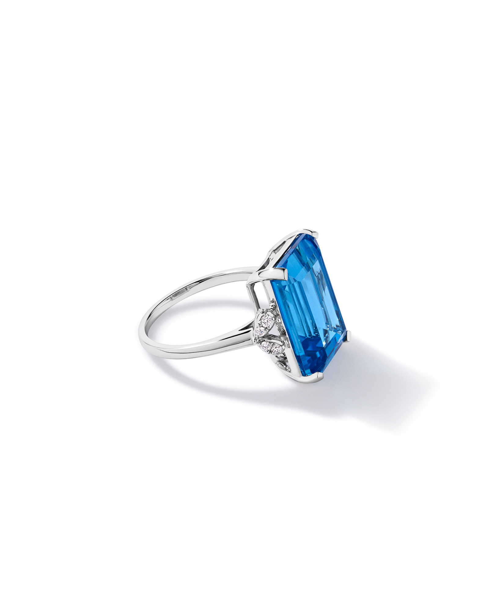 Emerald Cut Swiss Blue Topaz & 0.08 Carat TW Diamond Ring 10kt Gold