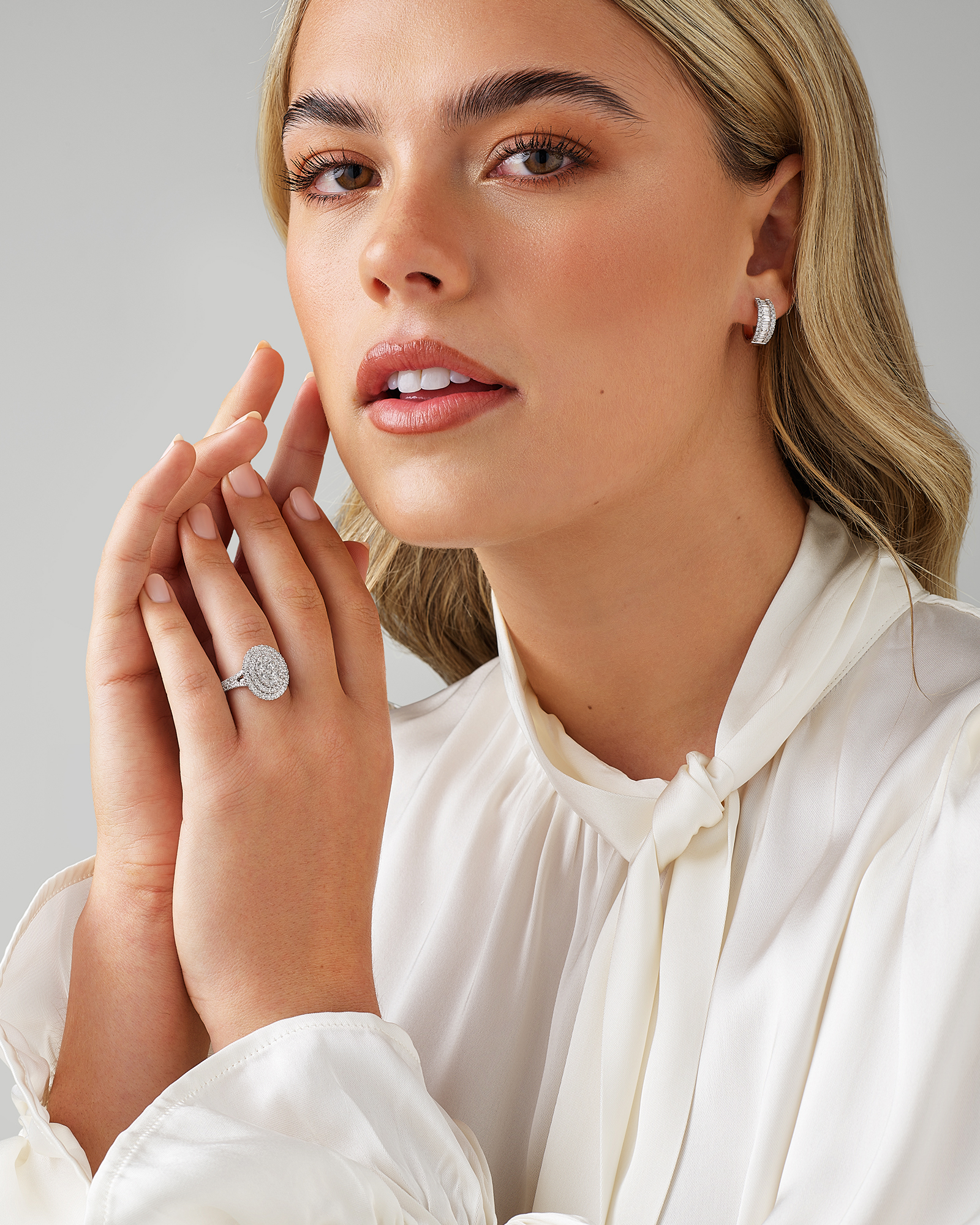 1.30 Carat TW Oval Shaped Cluster Halo Diamond Ring in 10kt White Gold