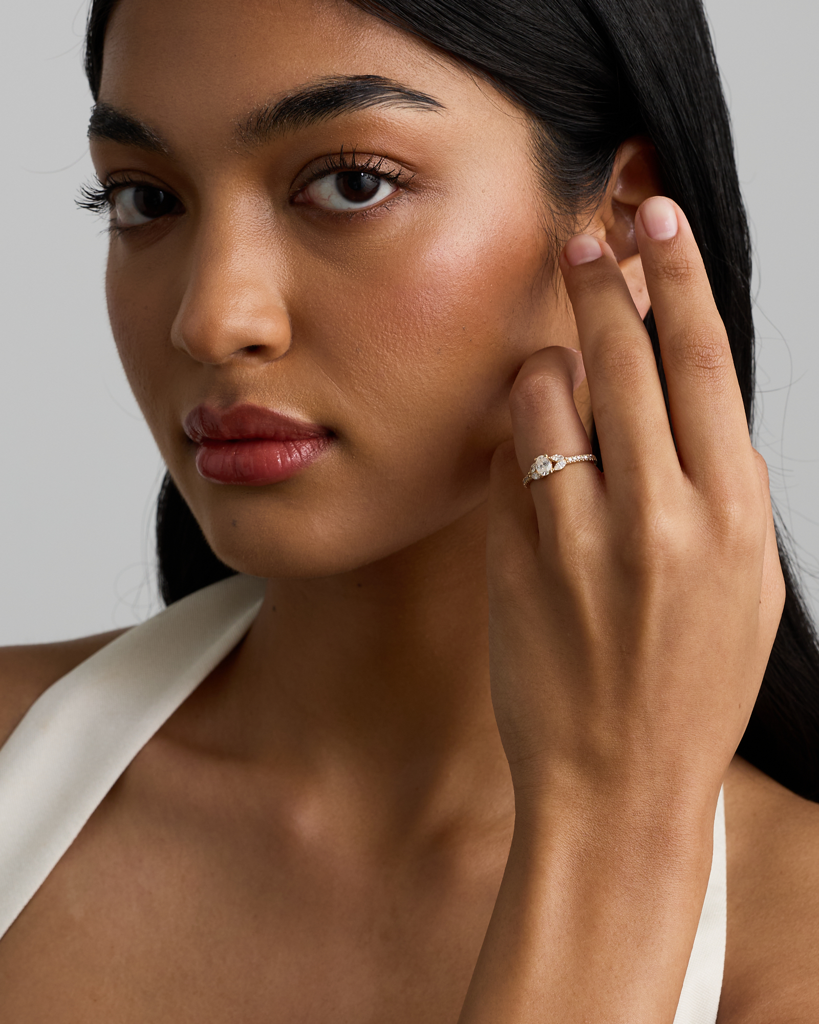 0.59 Carat TW Oval, Round Brilliant and Marquise Diamond Side Accent Ring 14kt Yellow Gold