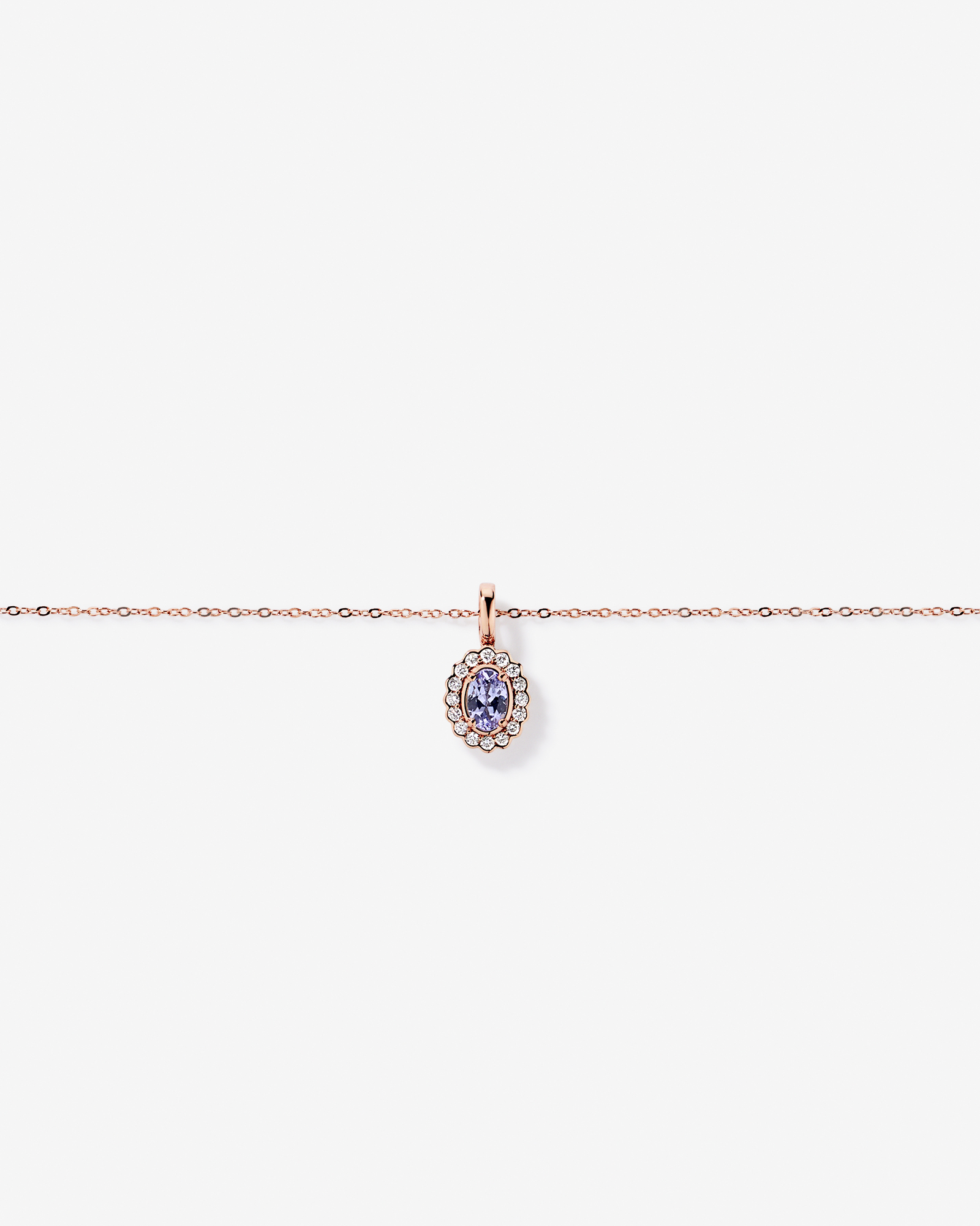 Tanzanite & 0.15TW of Diamond Halo Pendant with Chain in 10kt Rose Gold