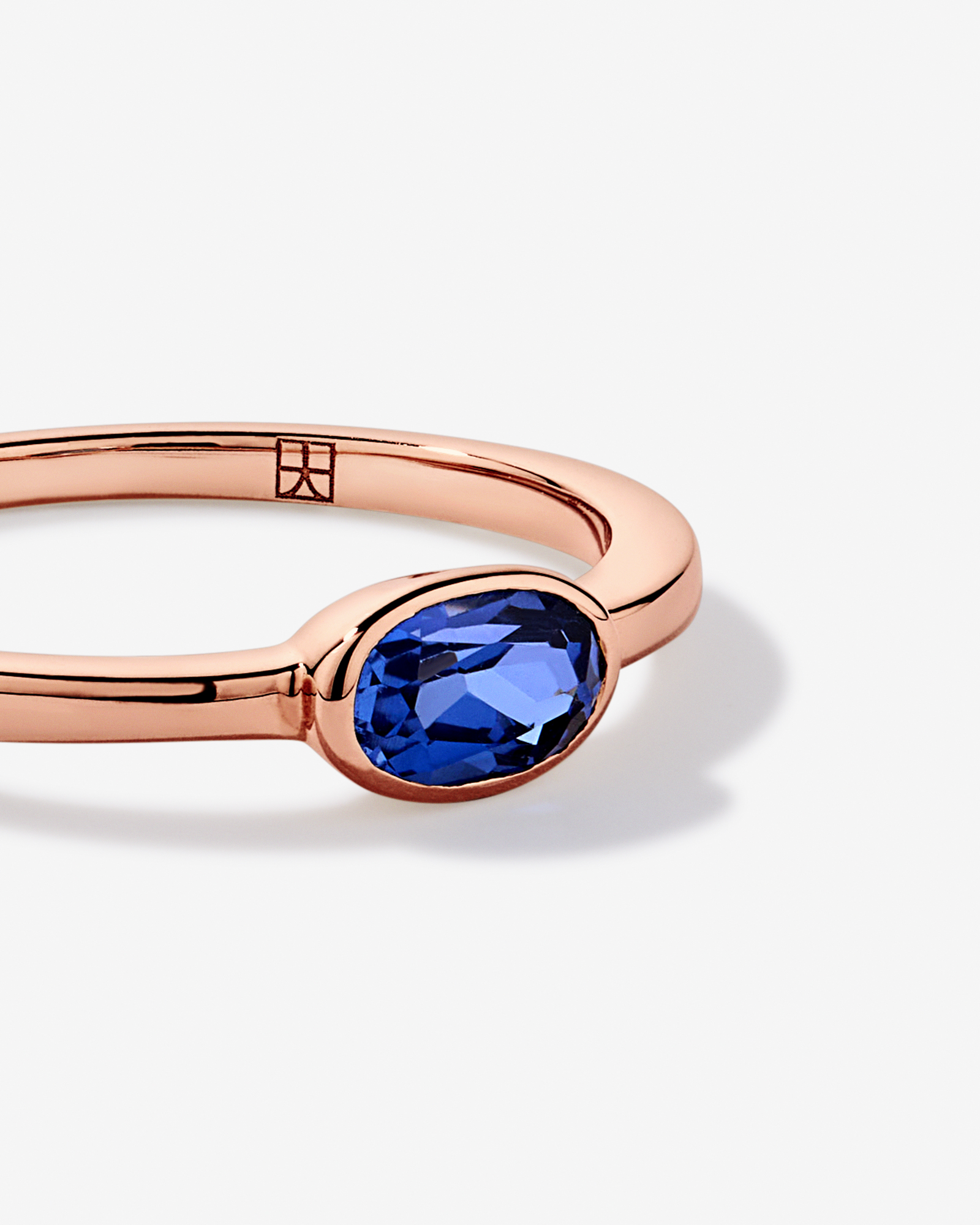 Oval Blue Created Sapphire East-to-West Set Bezel Ring 10kt Rose Gold
