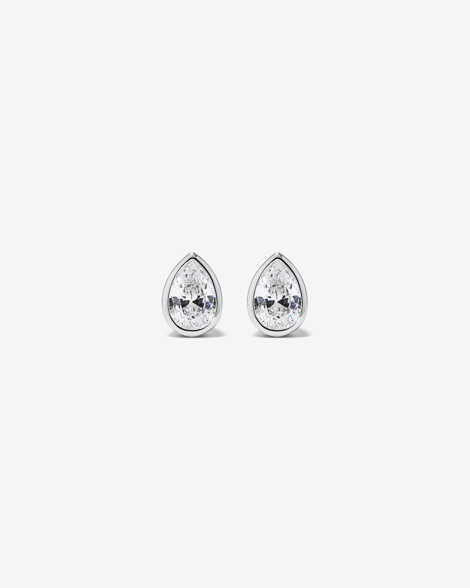 Pear Shaped Cubic Zirconia Bezel Set Stud Earrings in Sterling Silver