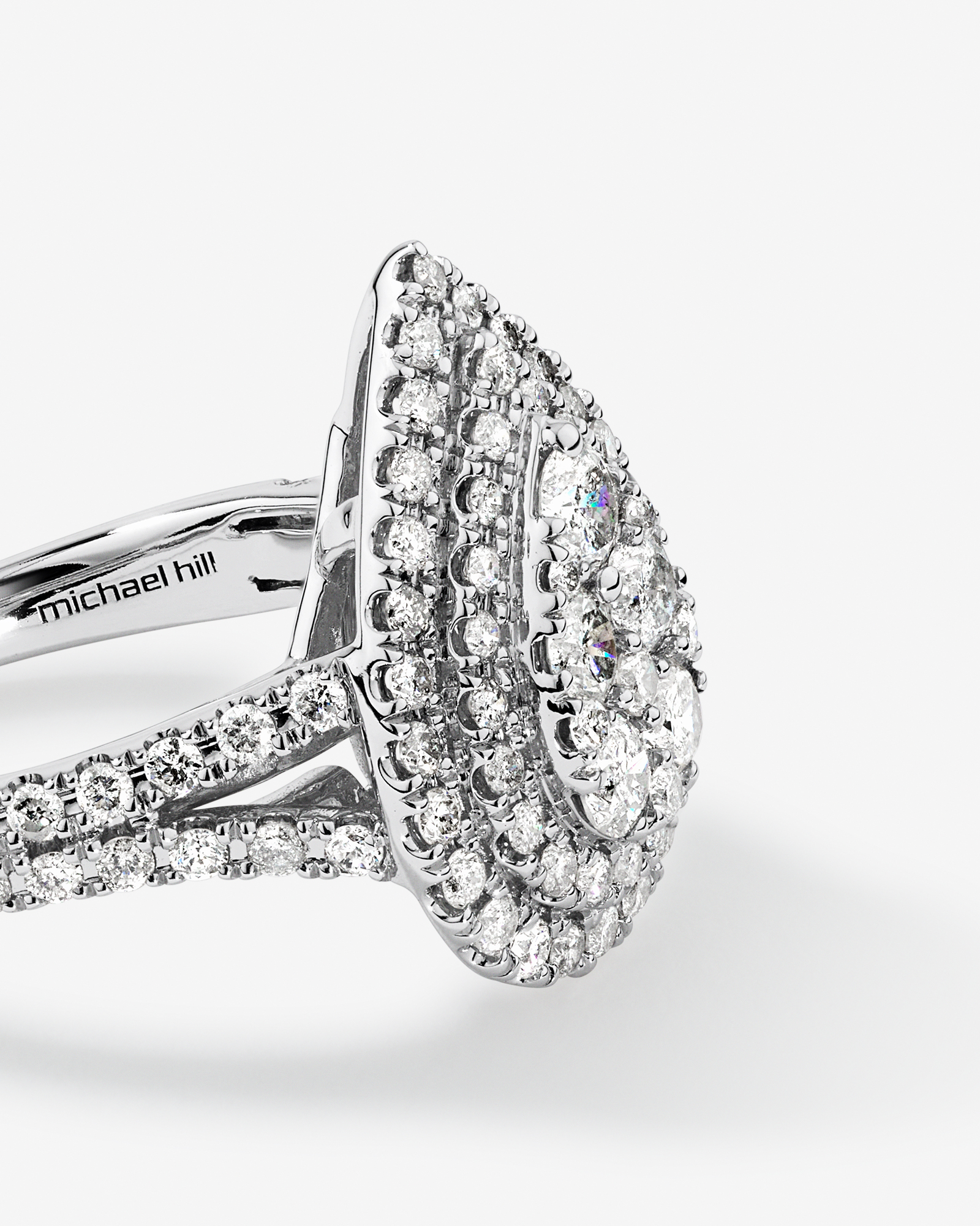 1.30 Carat TW Pear Shaped Cluster Halo Diamond Ring in 10kt White Gold