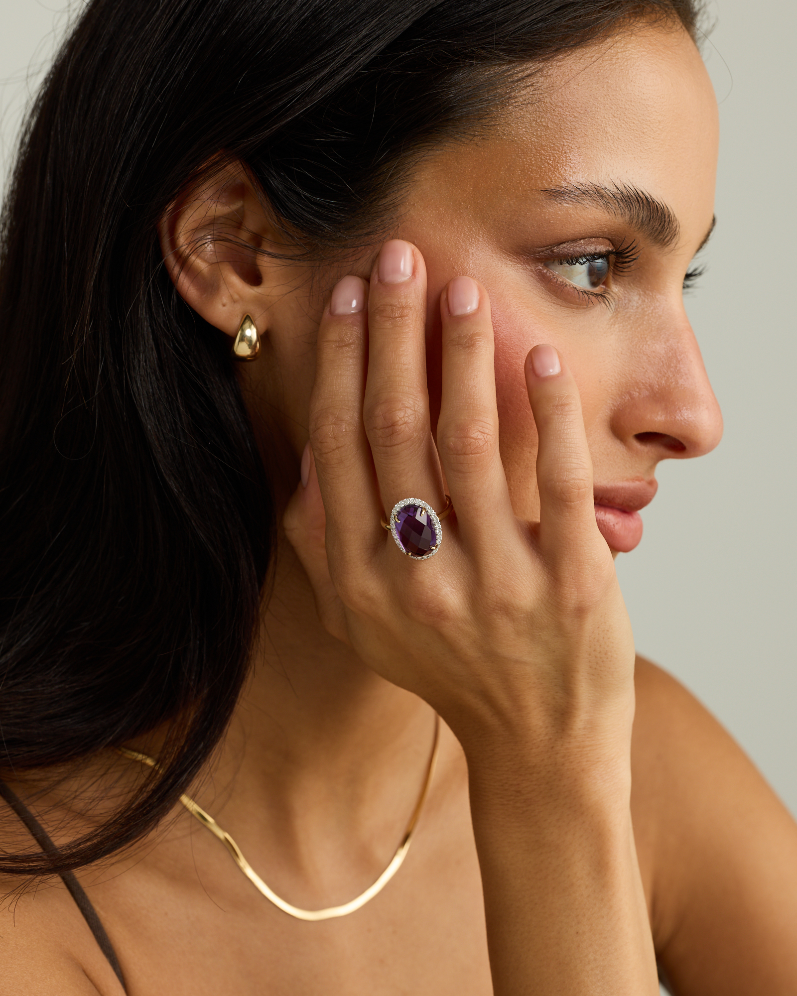 Oval Amethyst & 0.35 Carat TW Diamond Halo Ring 10kt Yellow Gold with Rhodium