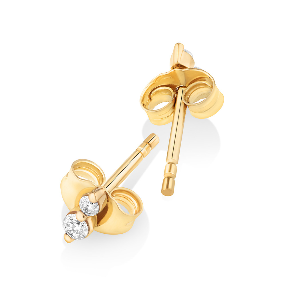 Boucles d'oreilles clous deux pierres en or jaune 10kt