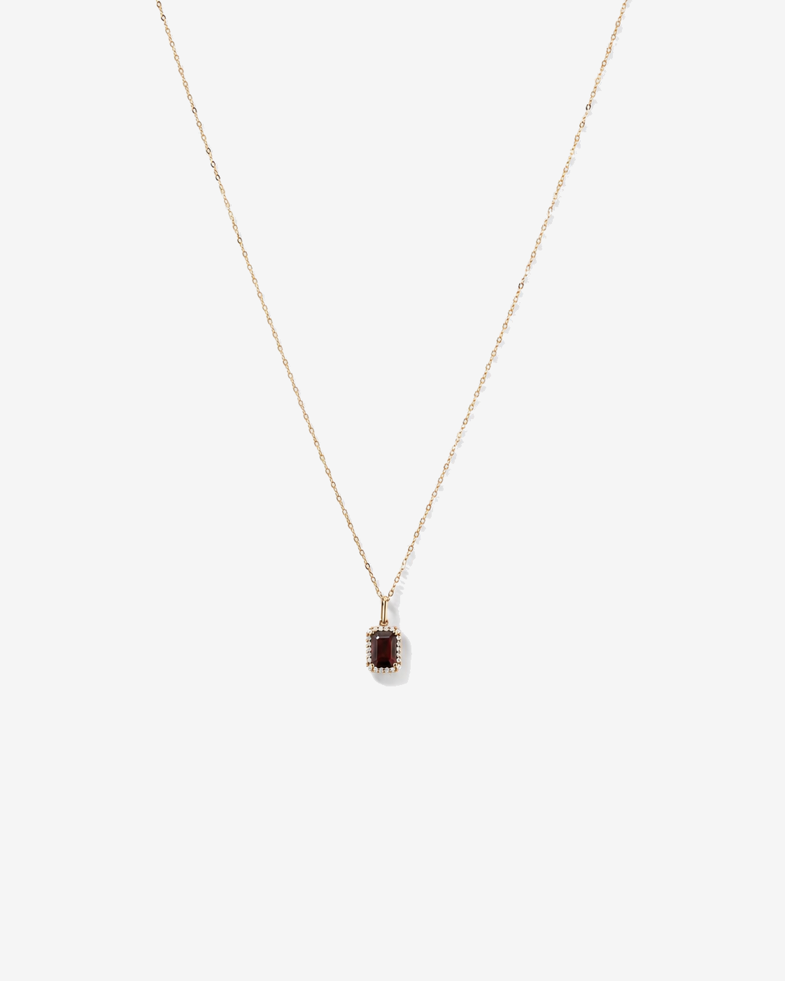 Emerald Cut Garnet and Diamond Halo Pendant with Chain in 10kt Yellow Gold