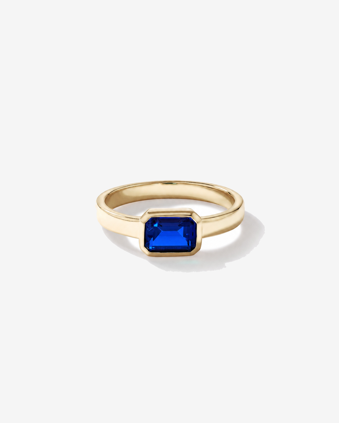 Created Sapphire Bezel Ring 10kt Yellow Gold